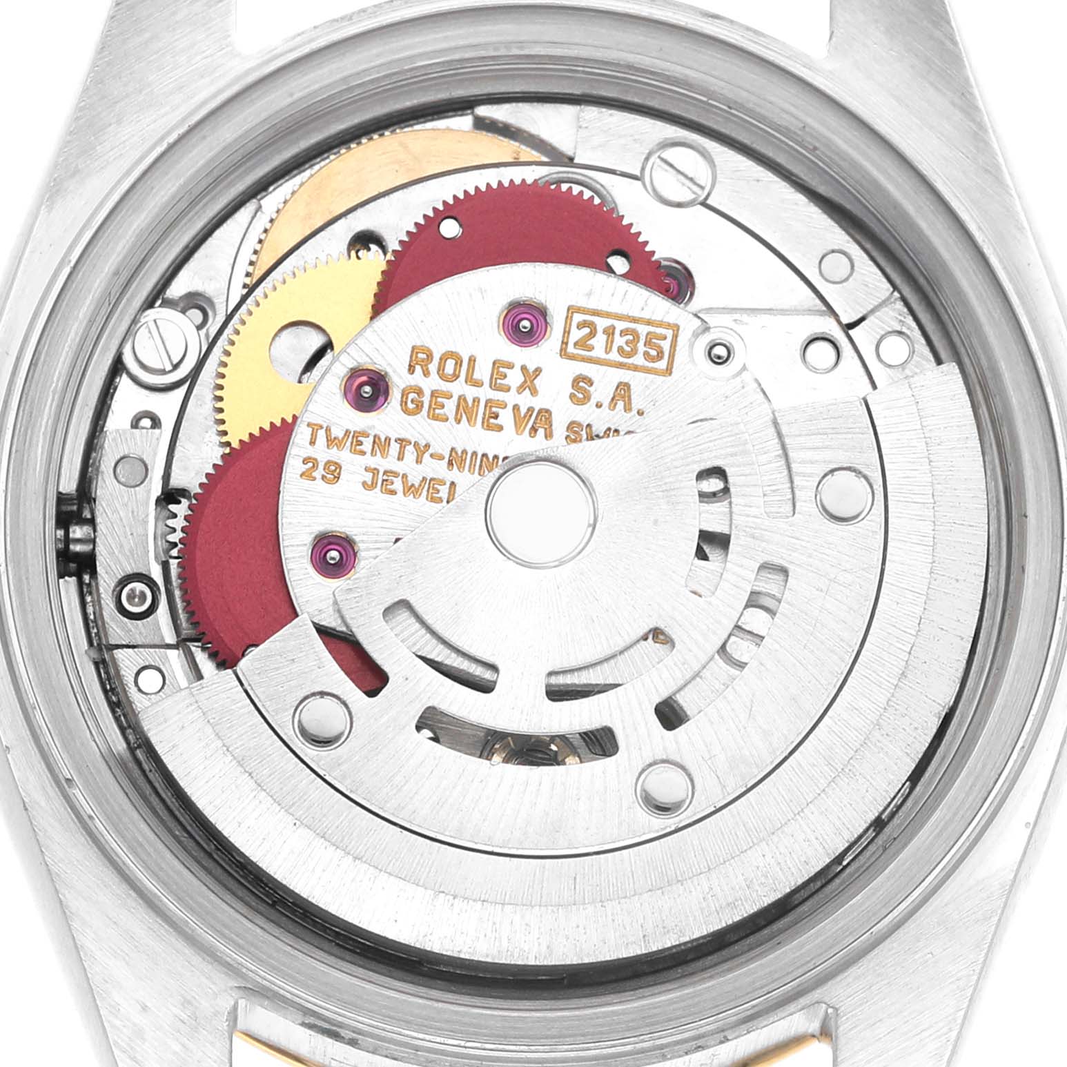 The image shows the internal mechanism of a Rolex Datejust 69163 Women's Steel and Gold (two tone) Champagne Dial, featuring gears and jewels from a top-down angle.