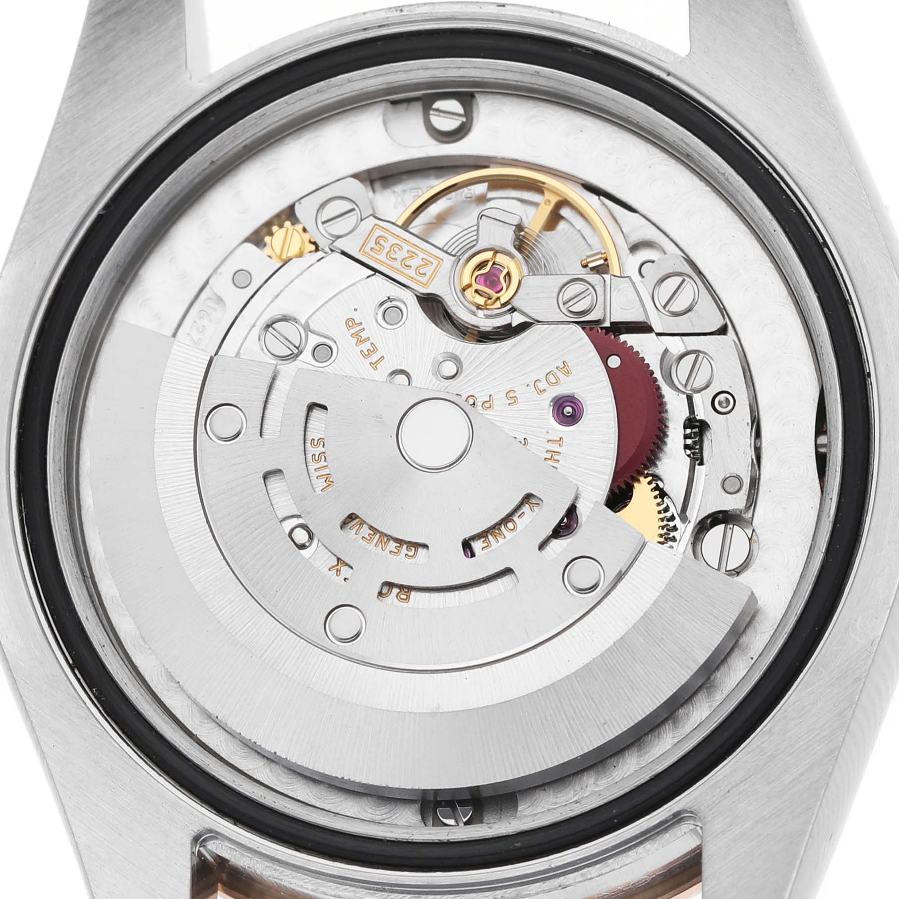 The image shows the movement of a Rolex Datejust 178341 Women's Steel and Gold (two tone) Mother of Pearl Dial watch from a top-down angle, highlighting gears and the rotor.