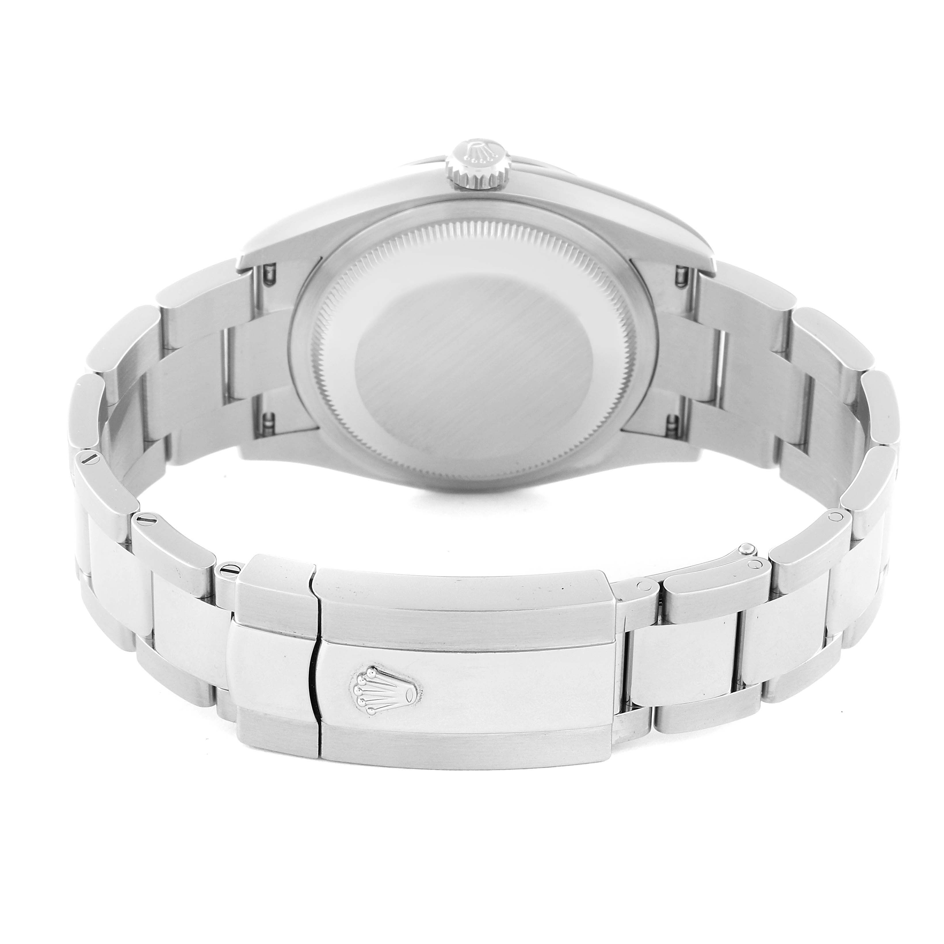 The image shows the back view of a Rolex Datejust 126200 Men's Stainless Steel Blue Dial 126200 Men's Stainless Steel Blue Dial watch, highlighting the case back and the bracelet with the clasp.