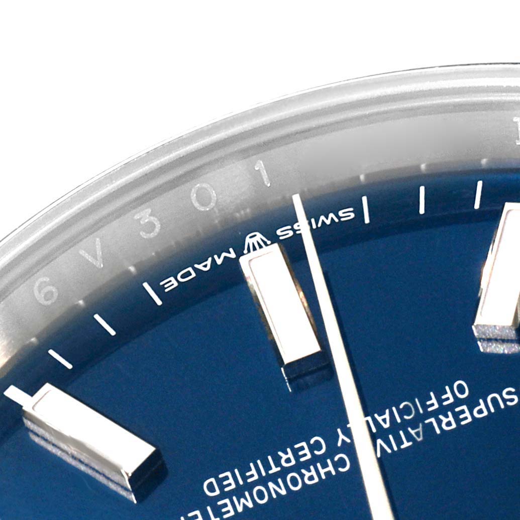 This close-up angle shows part of the dial and indices of the Rolex Datejust 126200 Men's Stainless Steel Blue Dial 126200 Men's Stainless Steel Blue Dial watch.