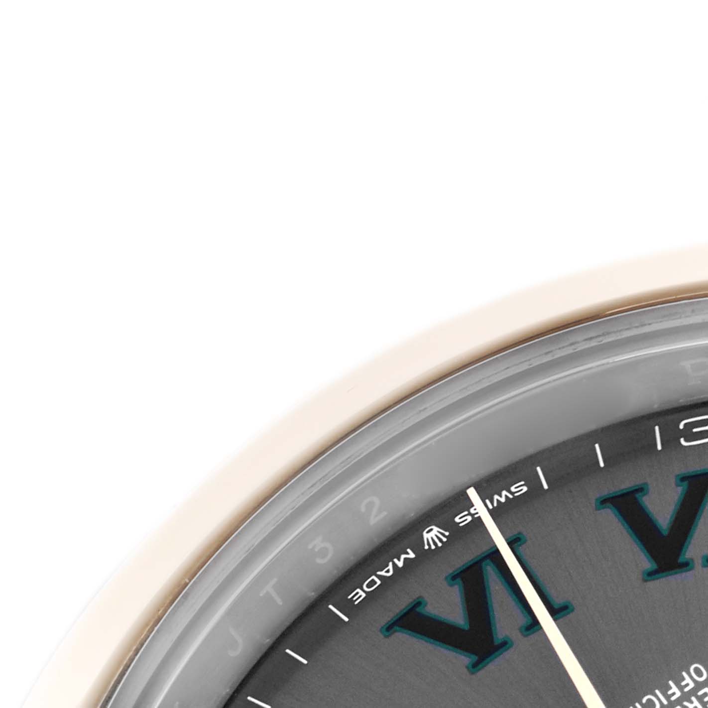 The close-up shows part of the dial and hands of a Rolex Datejust 41 126303 Men's Steel and Gold (two tone) Grey Dial 126303 Men's Steel and Gold (two tone) Grey Dial, highlighting numerals and text.