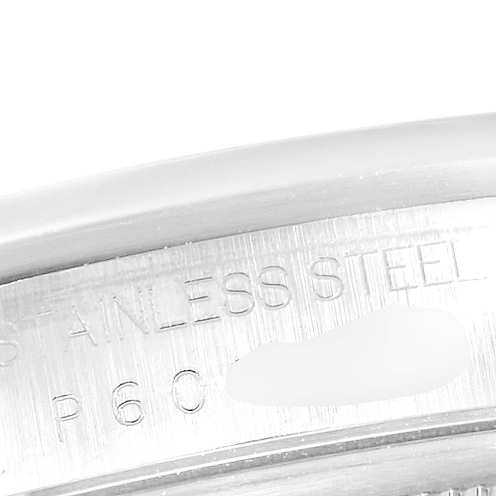 The image shows a close-up of the stainless steel case back engraving on a Rolex Datejust 16200  Men's Stainless Steel Silver Dial 16200  Men's Stainless Steel Silver Dial watch.