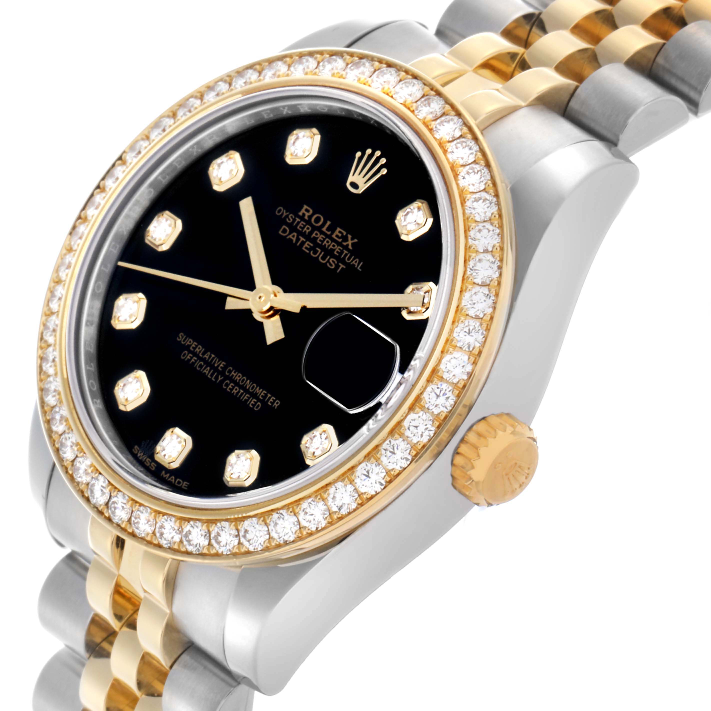 This Rolex Datejust mid-size watch is shown at an angled side view, highlighting its diamond bezel, black dial, and two-tone bracelet.
