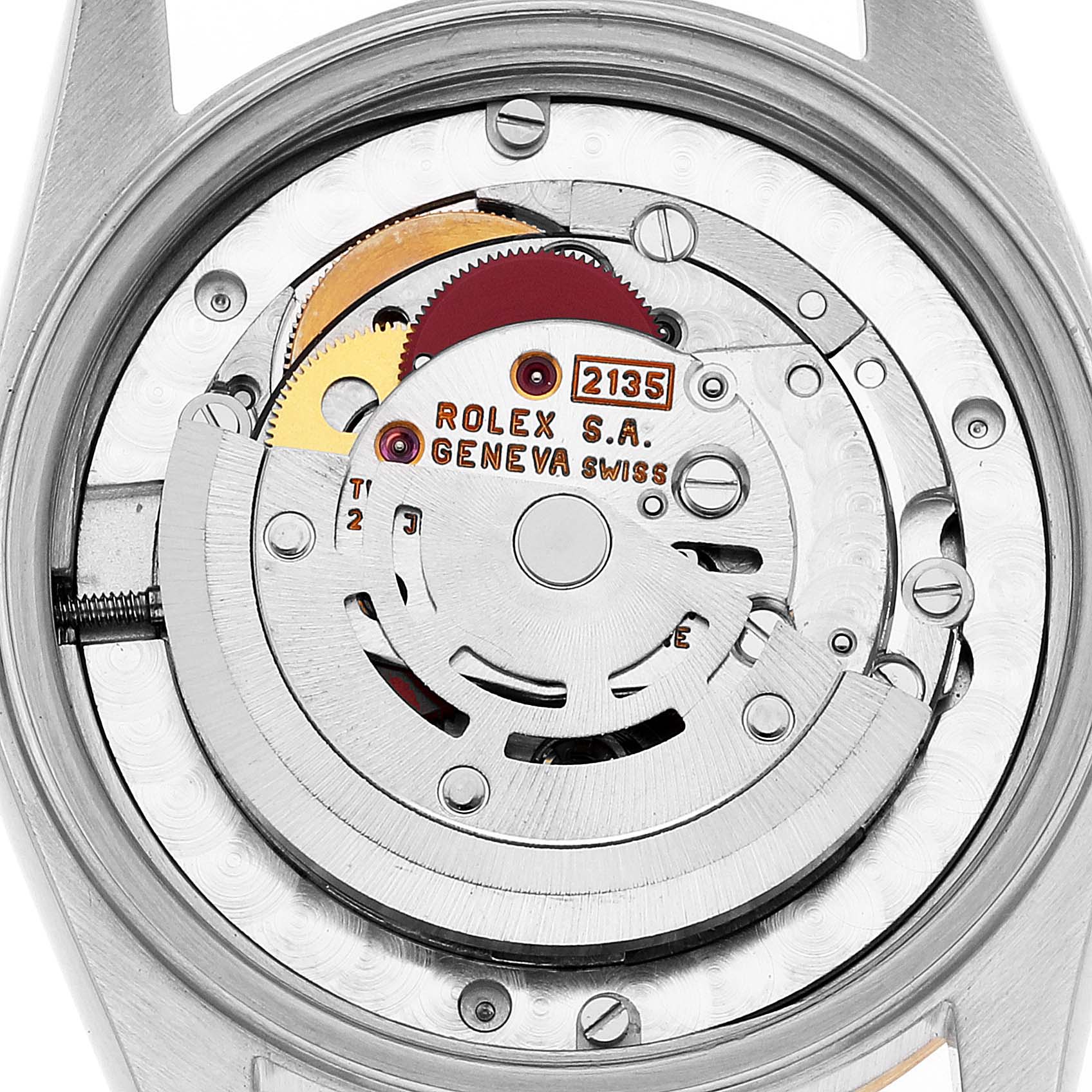 The image shows the internal mechanism of a mid-size Rolex watch model 2135 viewed from the back.