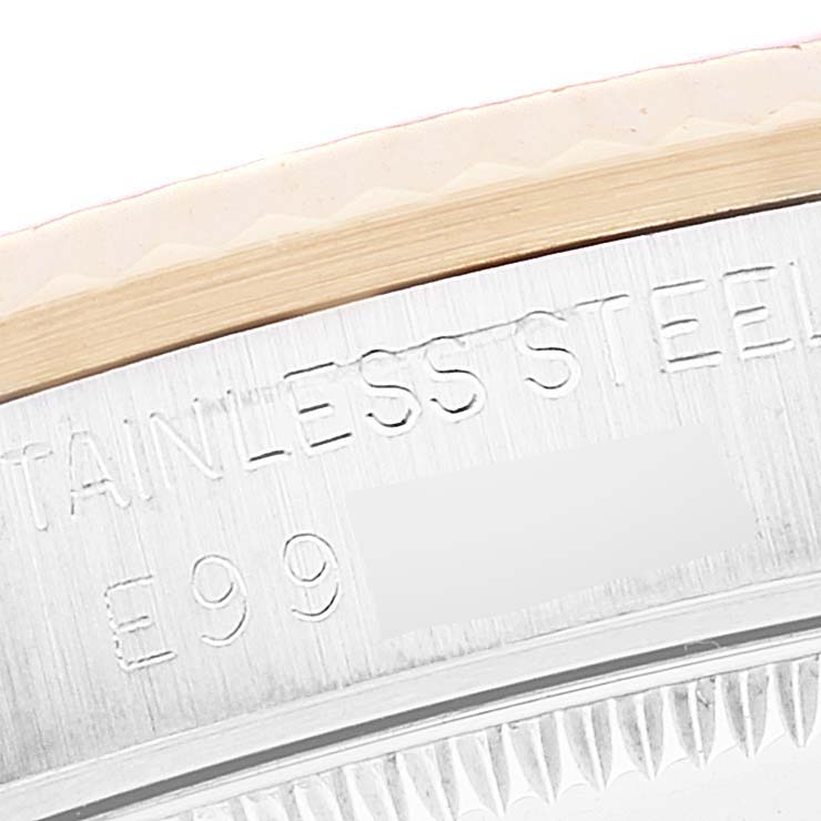 This close-up image shows the stainless steel case back of a Rolex Mid-Size 68273 Women
s Steel and Gold (two tone) Black Dial 68273 Women
s Steel and Gold (two tone) Black Dial model watch.