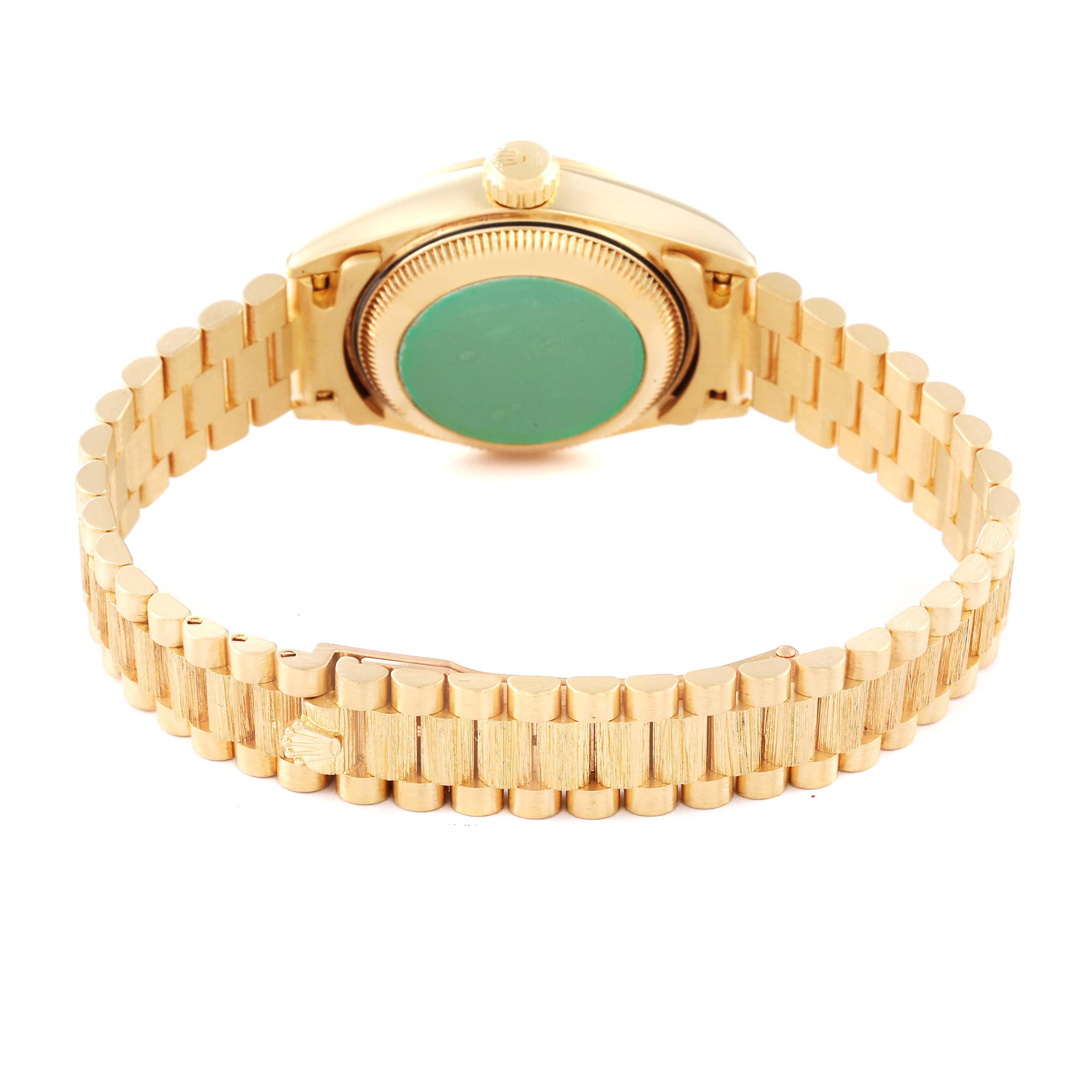 The image shows the back view of the Rolex President 69278 Women
s Yellow Gold Champagne Dial 69278 Women
s Yellow Gold Champagne Dial model watch, highlighting the bracelet and case back.