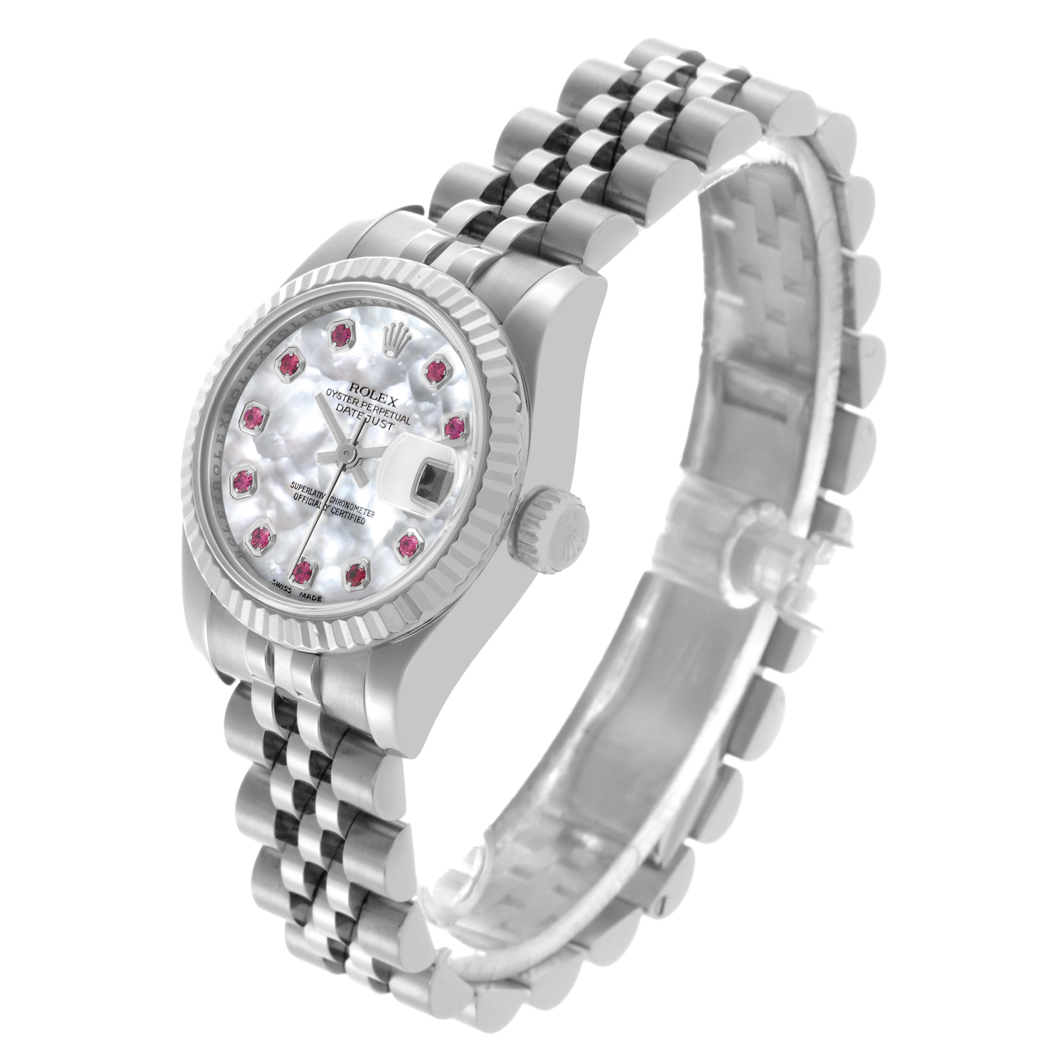 The Rolex Datejust 179174 Women's Stainless Steel Mother of Pearl Dial 179174 Women's Stainless Steel Mother of Pearl Dial watch is shown at an angled top view, displaying its face, bezel, crown, and bracelet.