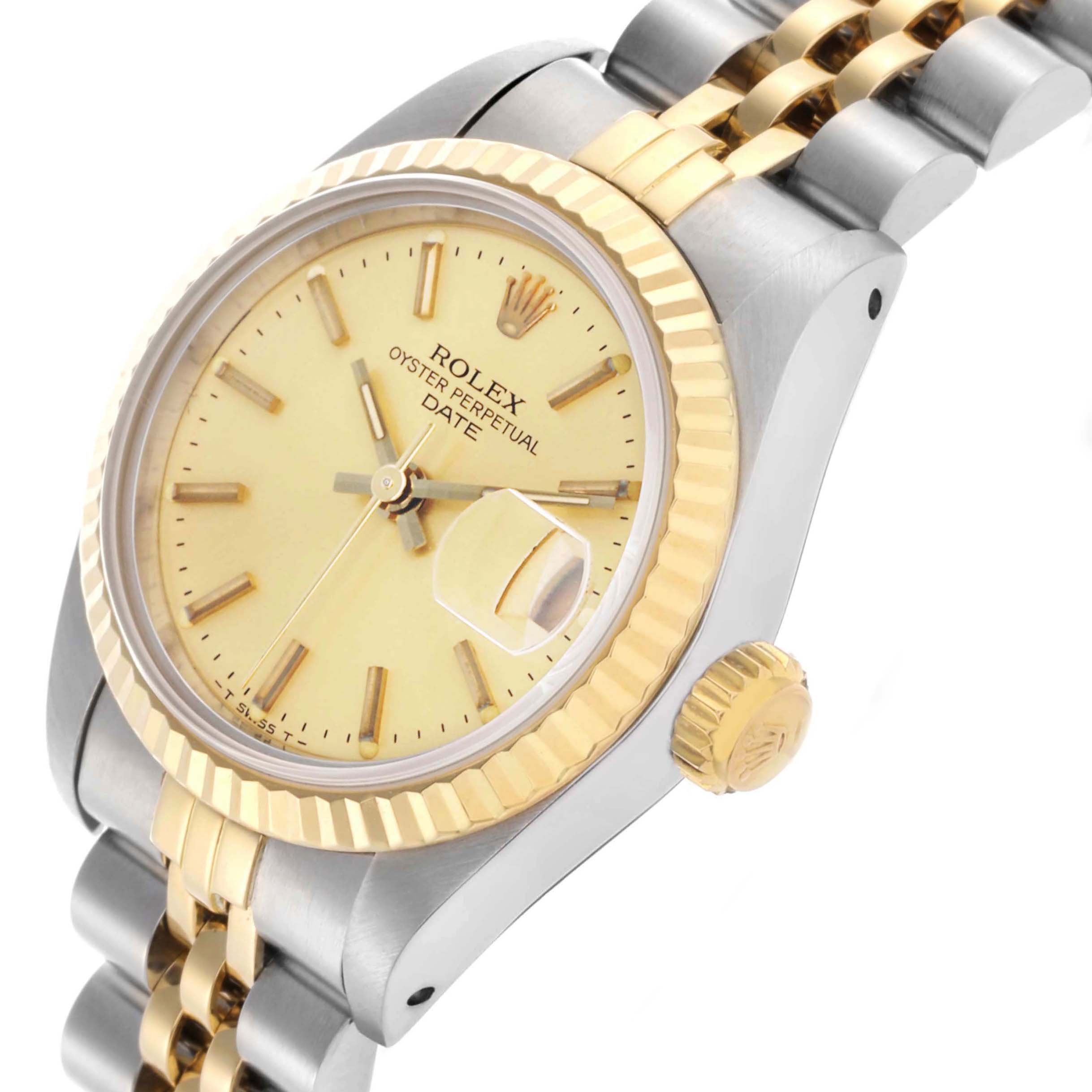 The Rolex Datejust 69173 Women's Steel and Gold (two tone) Champagne Dial 69173 Women's Steel and Gold (two tone) Champagne Dial watch is shown at a three-quarter angle, highlighting the dial, bezel, crown, and bracelet.
