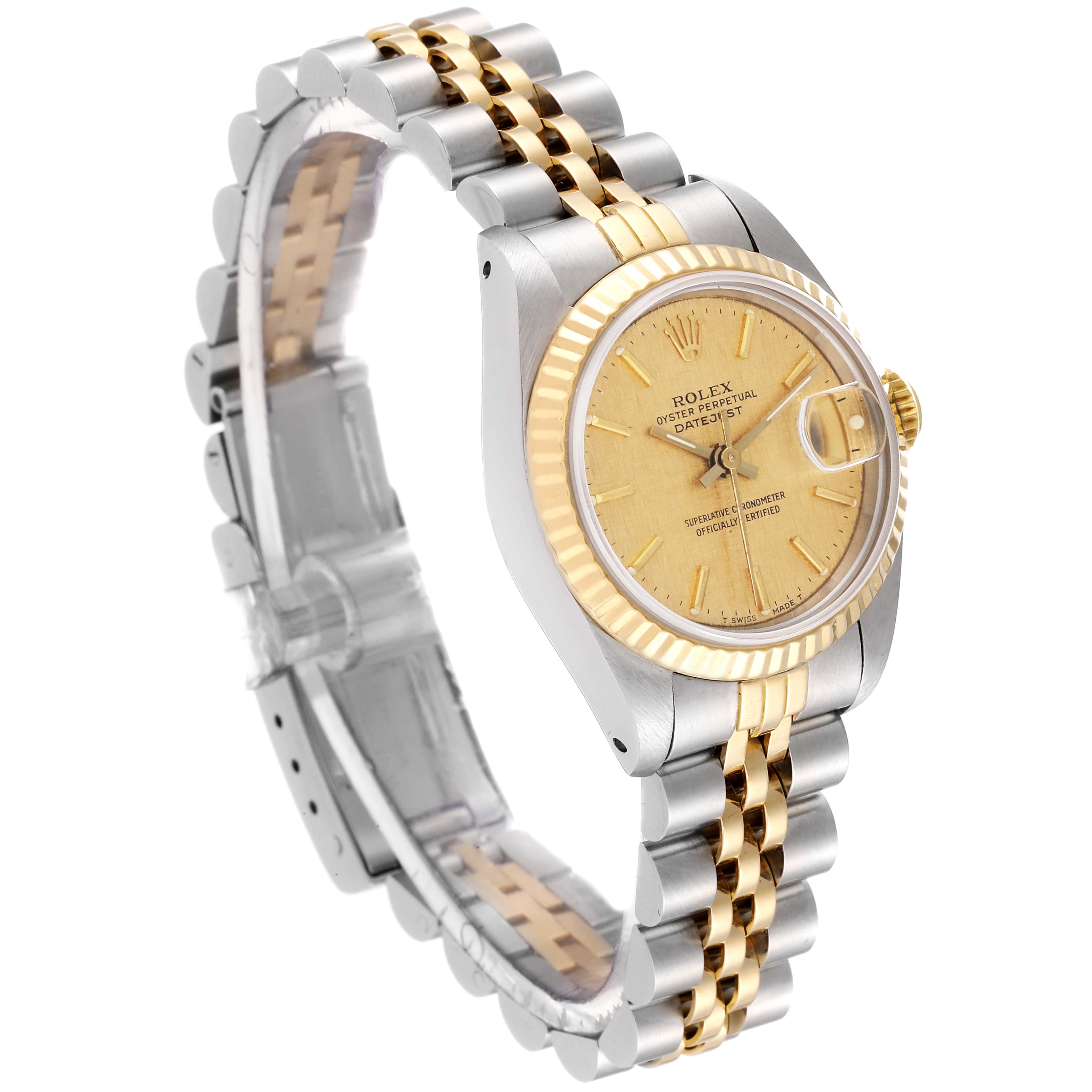 This image shows the Rolex Datejust 69173 Women's Steel and Gold (two tone) Champagne Dial 69173 Women's Steel and Gold (two tone) Champagne Dial watch at an angled side view, highlighting the gold face, bezel, and two-tone bracelet.