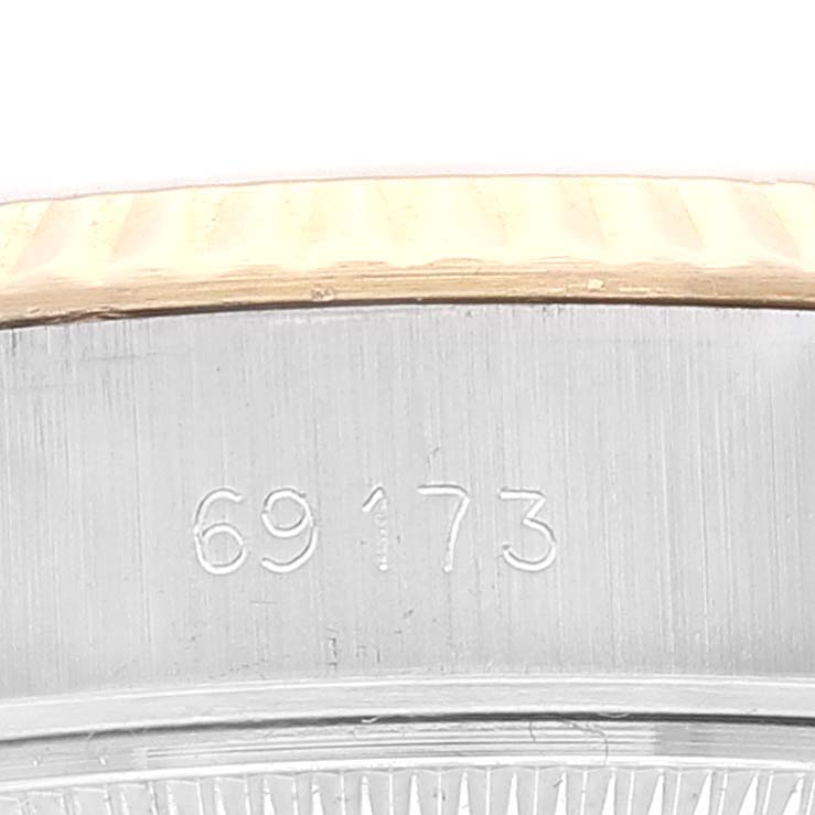 This is a close-up of the serial number engraved on the case side of a Rolex Datejust 69173 Women's Steel and Gold (two tone) Champagne Dial 69173 Women's Steel and Gold (two tone) Champagne Dial.