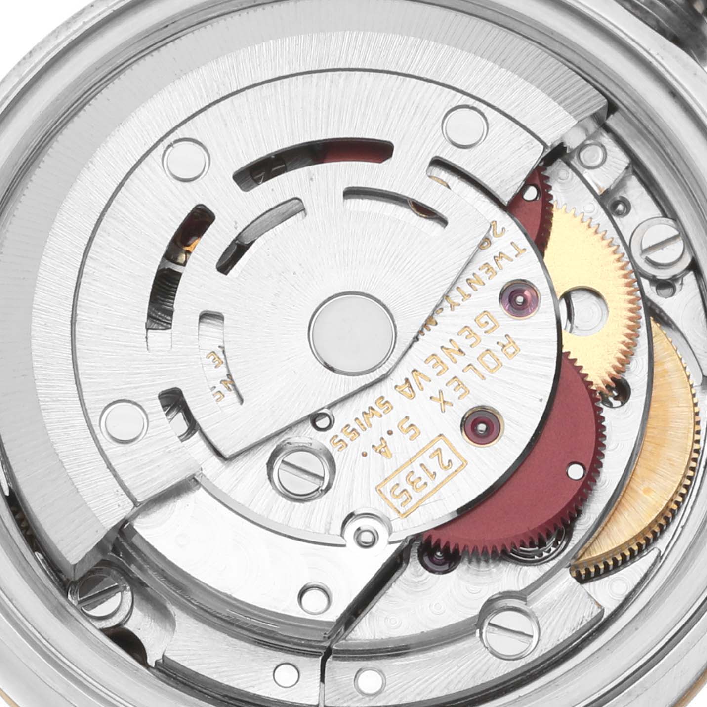This image shows the internal mechanism of a Rolex Datejust 69173 Women's Steel and Gold (two tone) Champagne Dial 69173 Women's Steel and Gold (two tone) Champagne Dial watch, including gears and the rotor.