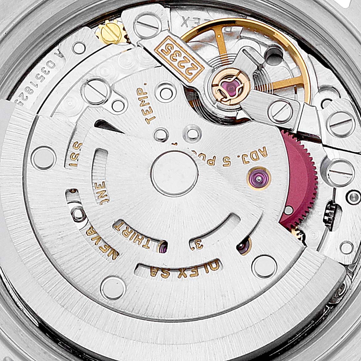 This image shows a close-up view of the mechanical movement inside a Rolex Datejust 79173 Women's Steel and Gold (two tone) Grey Dial 79173 Women's Steel and Gold (two tone) Grey Dial model watch, highlighting gears and rotors.