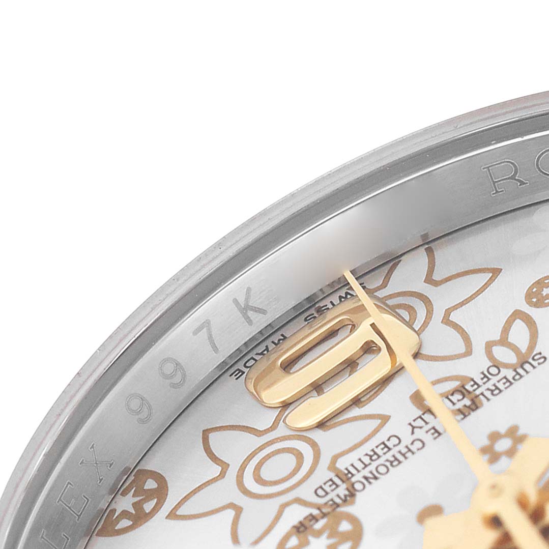 The image shows a close-up of the dial and bezel edge of a Rolex Datejust 116233 Men's Steel and Gold (two tone) Silver Dial, highlighting the hour markers and inner engraving.