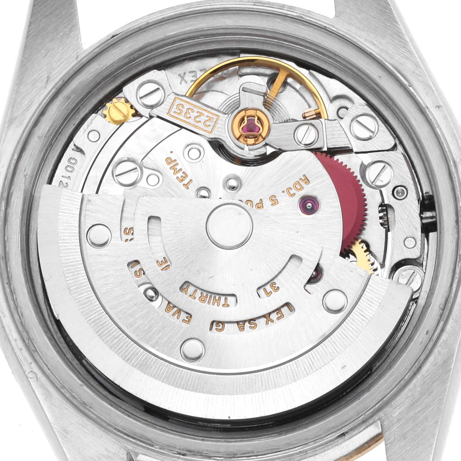 The image shows the movement of a Rolex Datejust 79163 Women's Steel and Gold (two tone) Grey Dial 79163 Women's Steel and Gold (two tone) Grey Dial watch from a rear view, highlighting gears and components.