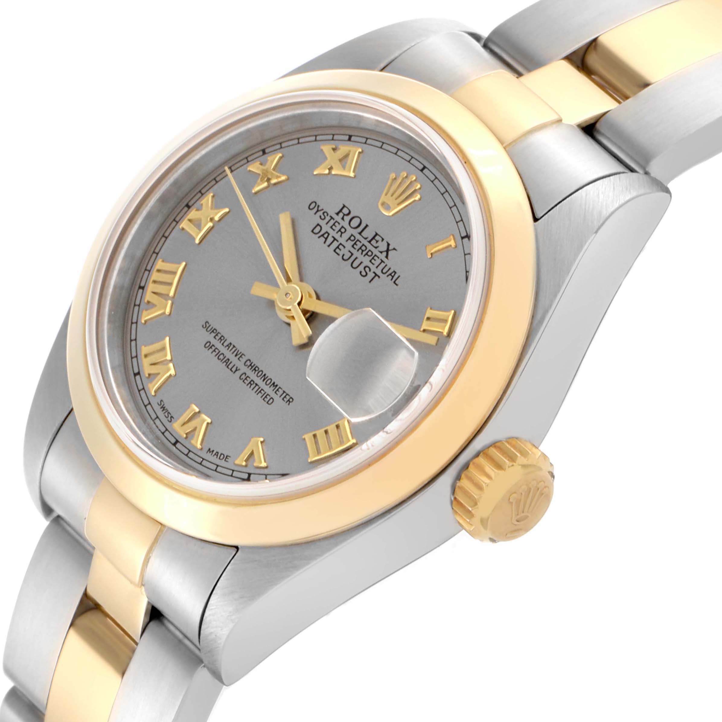 The Rolex Datejust 79163 Women's Steel and Gold (two tone) Grey Dial 79163 Women's Steel and Gold (two tone) Grey Dial watch is shown from a top-side angle, highlighting the dial, bezel, crown, and two-tone bracelet.