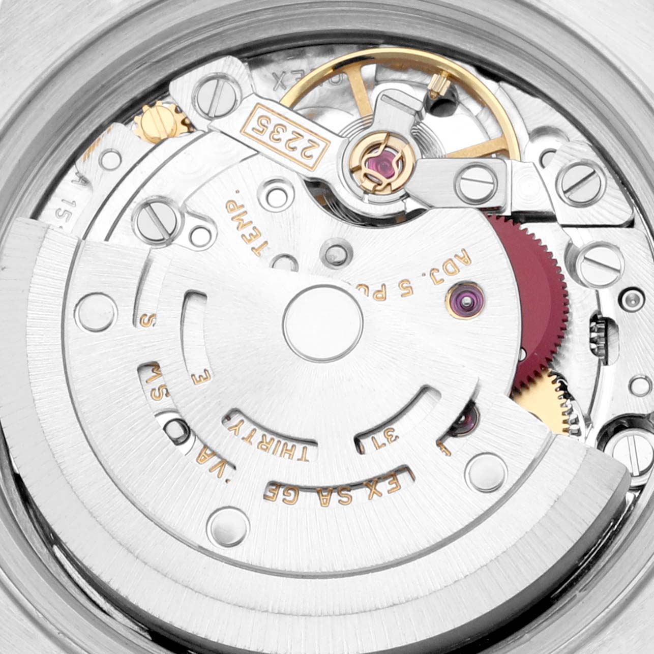 The image shows the internal mechanical movement of the Rolex Datejust 79173 Women's Steel and Gold (two tone) White Dial 79173 Women's Steel and Gold (two tone) White Dial watch, focusing on the rotor and geartrain components.