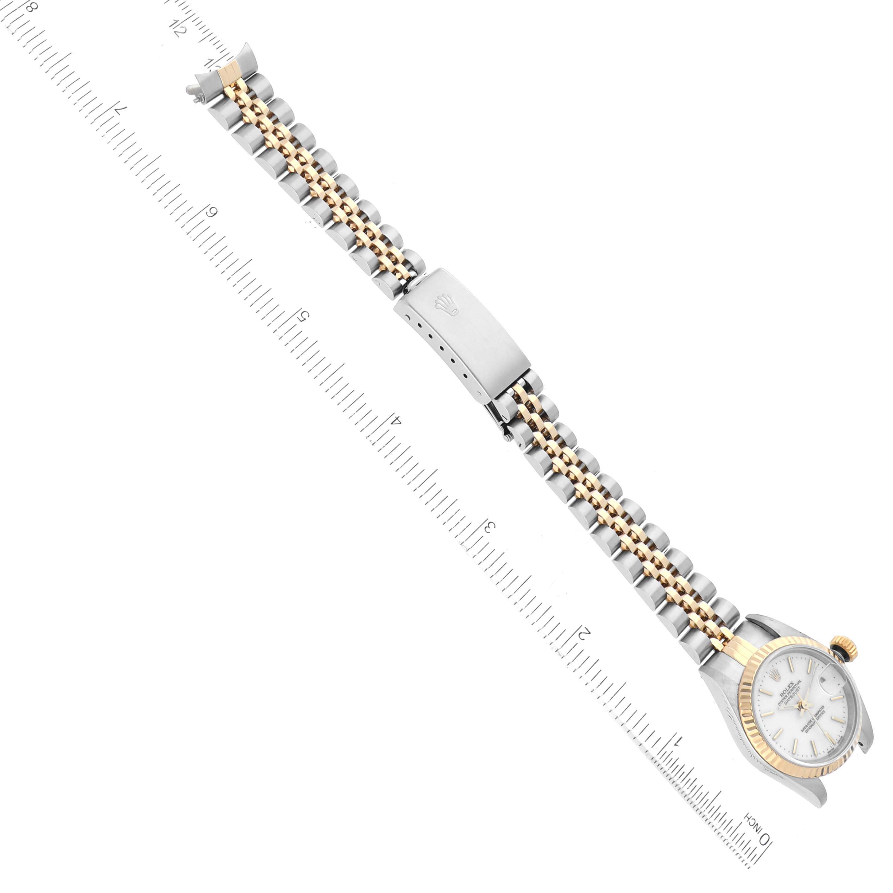 This image shows the Rolex Datejust 79173 Women's Steel and Gold (two tone) White Dial 79173 Women's Steel and Gold (two tone) White Dial watch from a top-down angle, highlighting the bracelet, clasp, and partial dial.