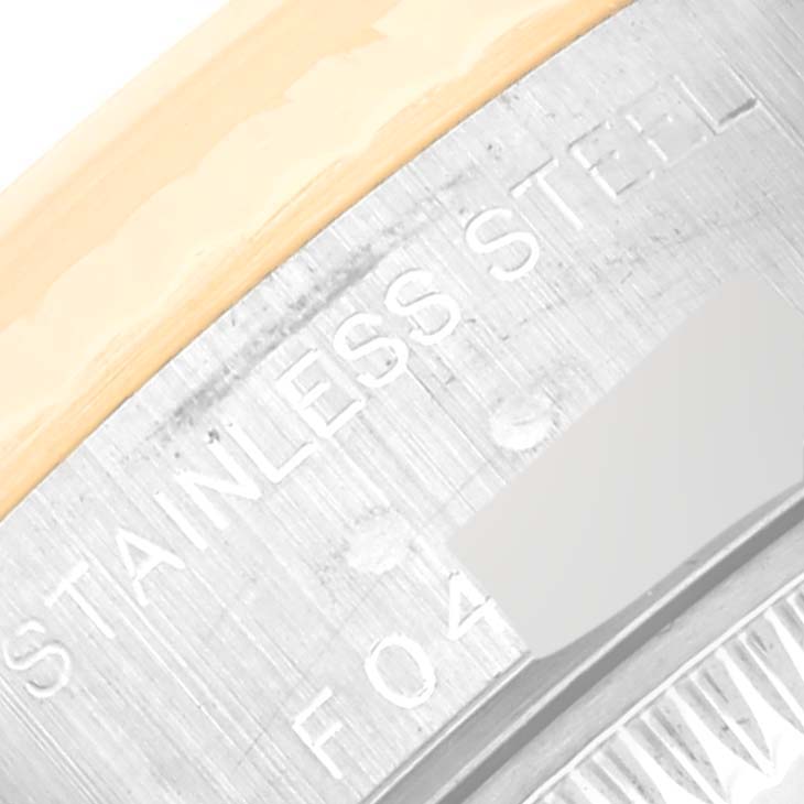 The image shows a close-up angle of the bezel and case of the Rolex Datejust 79173 Women's Steel and Gold (two tone) White Dial 79173 Women's Steel and Gold (two tone) White Dial watch, highlighting the stainless steel material.