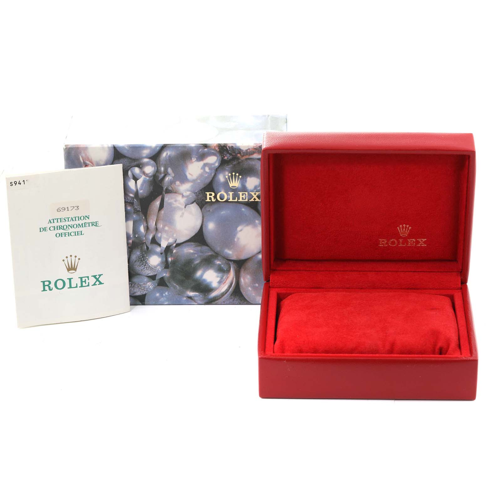 The image shows the packaging and warranty card for a Rolex Datejust 69173 Women's Steel and Gold (two tone) Champagne Dial 69173 Women's Steel and Gold (two tone) Champagne Dial model watch.