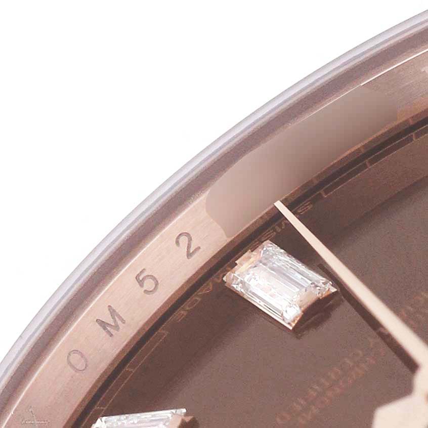 The image shows a close-up of the dial edge and diamond hour marker of a Rolex President 228345 Men's Rose Gold Brown Dial watch.