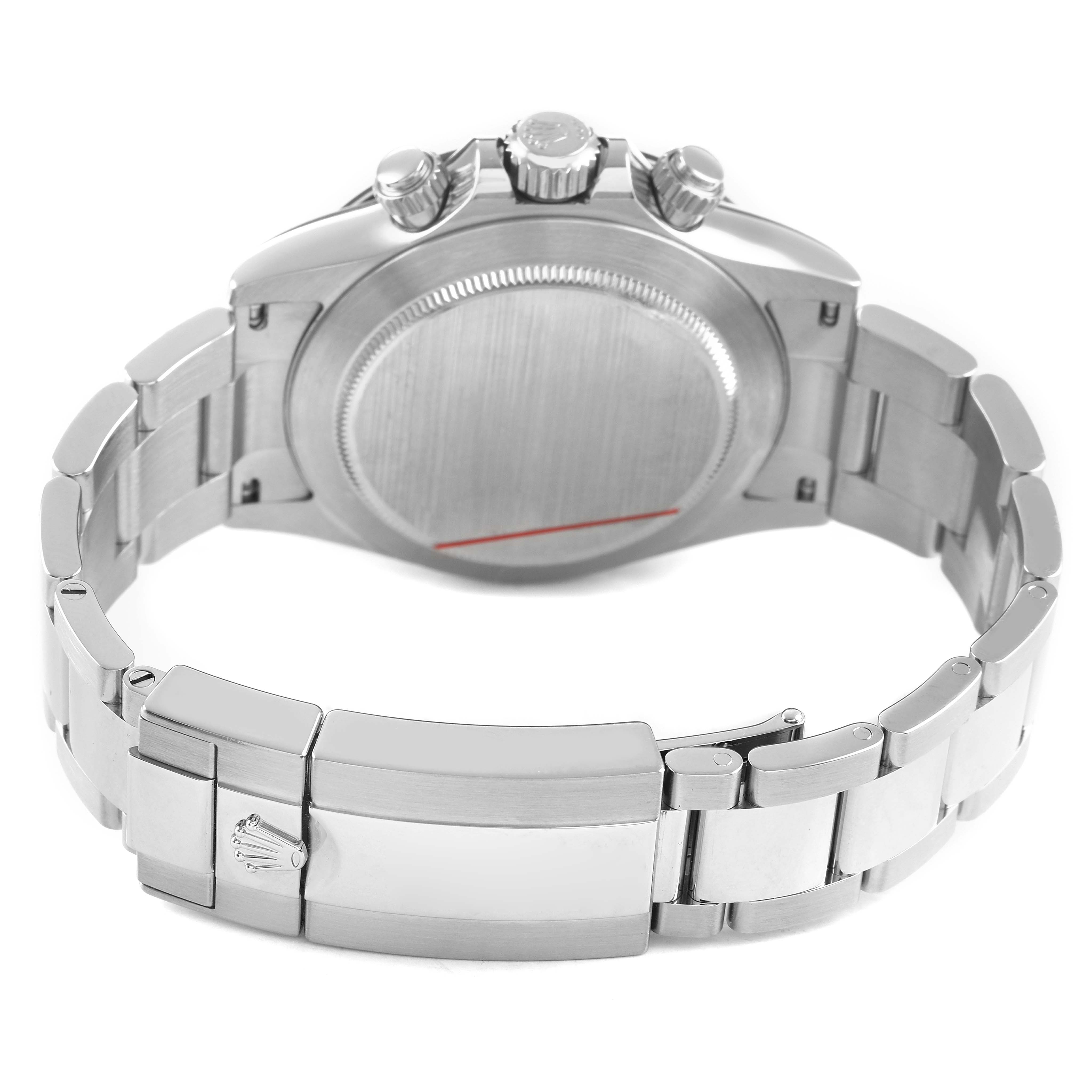 The image shows the back case, crown, and clasp of a Rolex Daytona 116500LN Men's Stainless Steel White Dial watch from a rear angle.