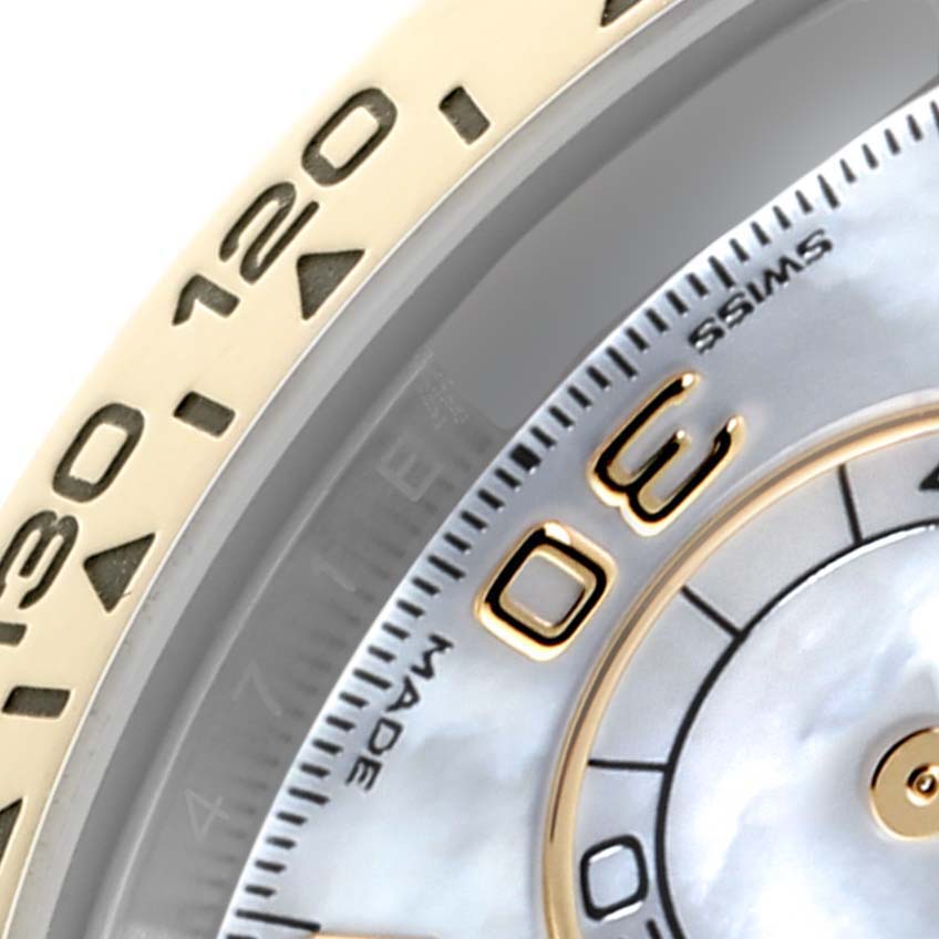 The image shows a close-up of the dial and bezel of a Rolex Daytona 116503 Men's Steel and Gold (two tone) Mother of Pearl Dial 116503 Men's Steel and Gold (two tone) Mother of Pearl Dial watch, highlighting the indices and part of the outer ring.