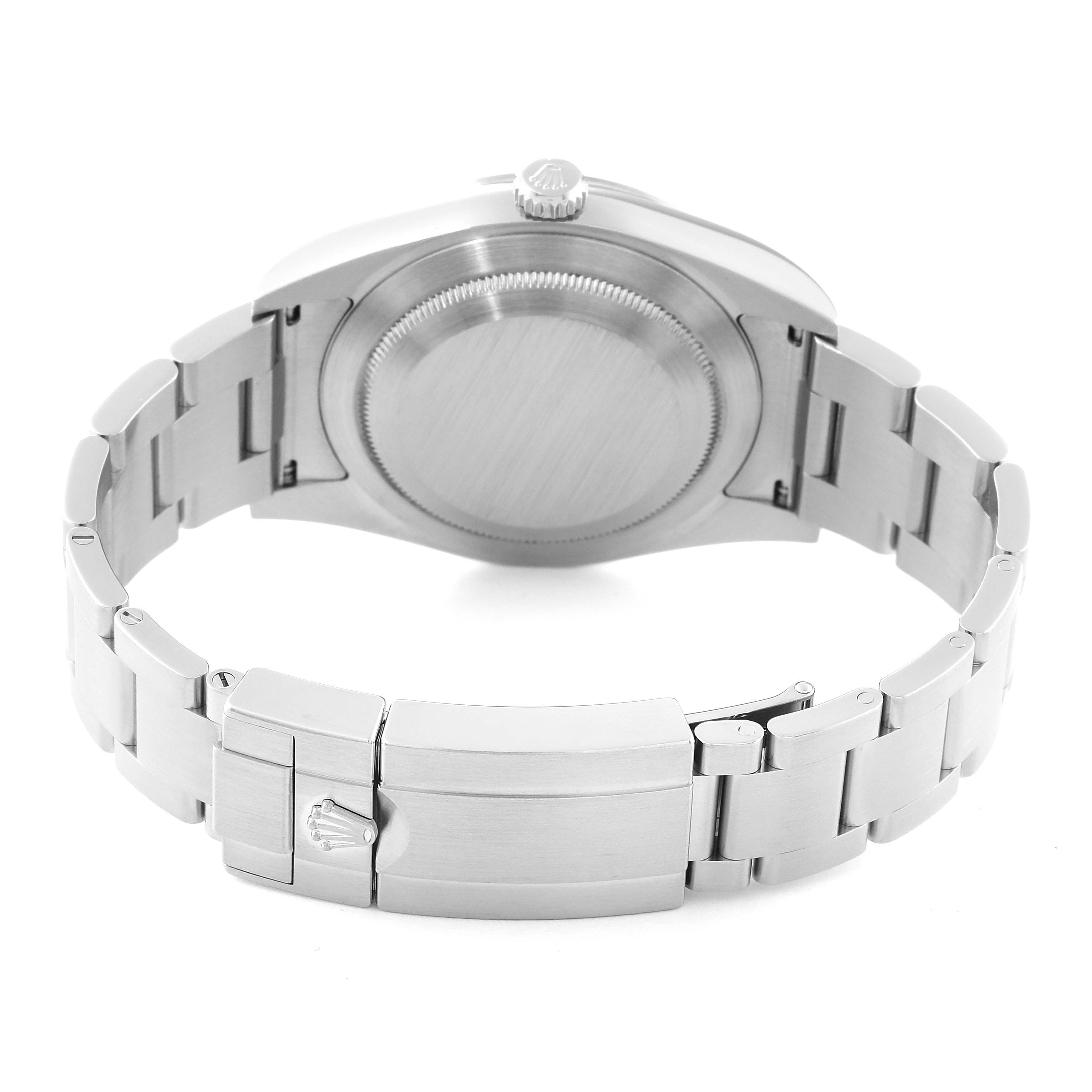 The image shows the back view of a Rolex Explorer 214270 Men
s Stainless Steel Black Dial 214270 Men
s Stainless Steel Black Dial watch, focusing on the case back and stainless steel bracelet with the clasp visible.