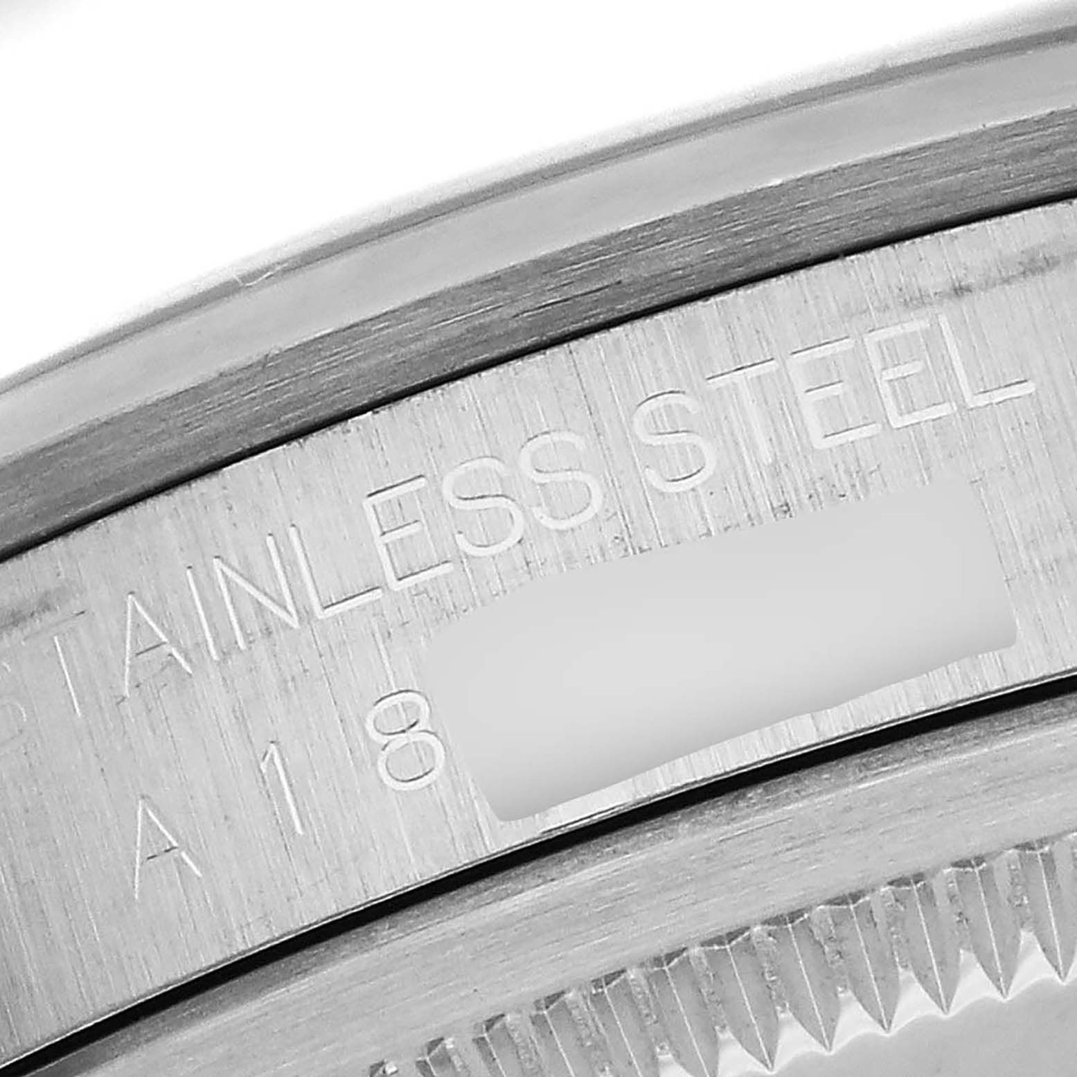 The image shows a close-up of the side engraving on a stainless steel Rolex Explorer 14270 Men's Stainless Steel Black Dial 14270 Men's Stainless Steel Black Dial watch.