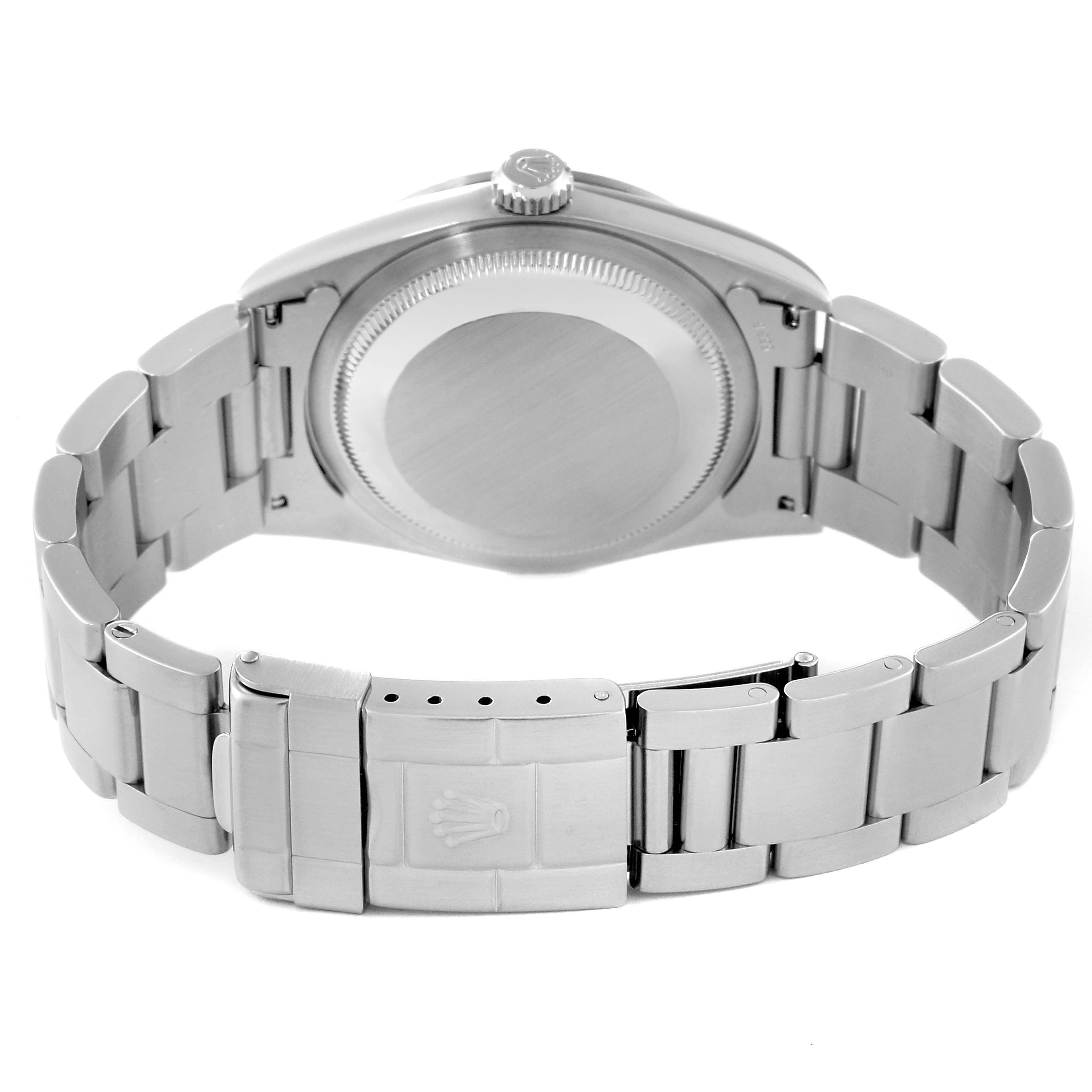 This image displays the backside of a Rolex Explorer 14270 Men's Stainless Steel Black Dial 14270 Men's Stainless Steel Black Dial watch, highlighting the case, crown, and bracelet with clasp.