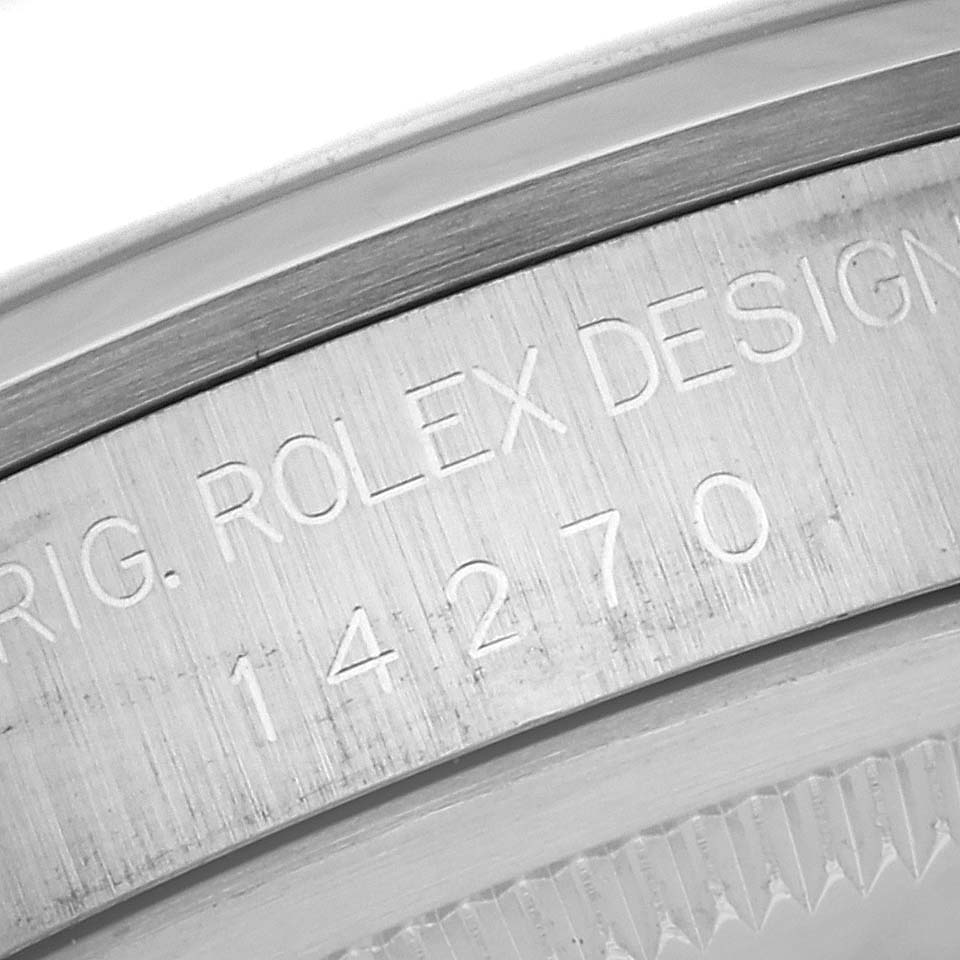 This is a close-up shot of the case back of a Rolex Explorer 14270 Men's Stainless Steel Black Dial 14270 Men's Stainless Steel Black Dial watch, showing the engraved model and brand details.