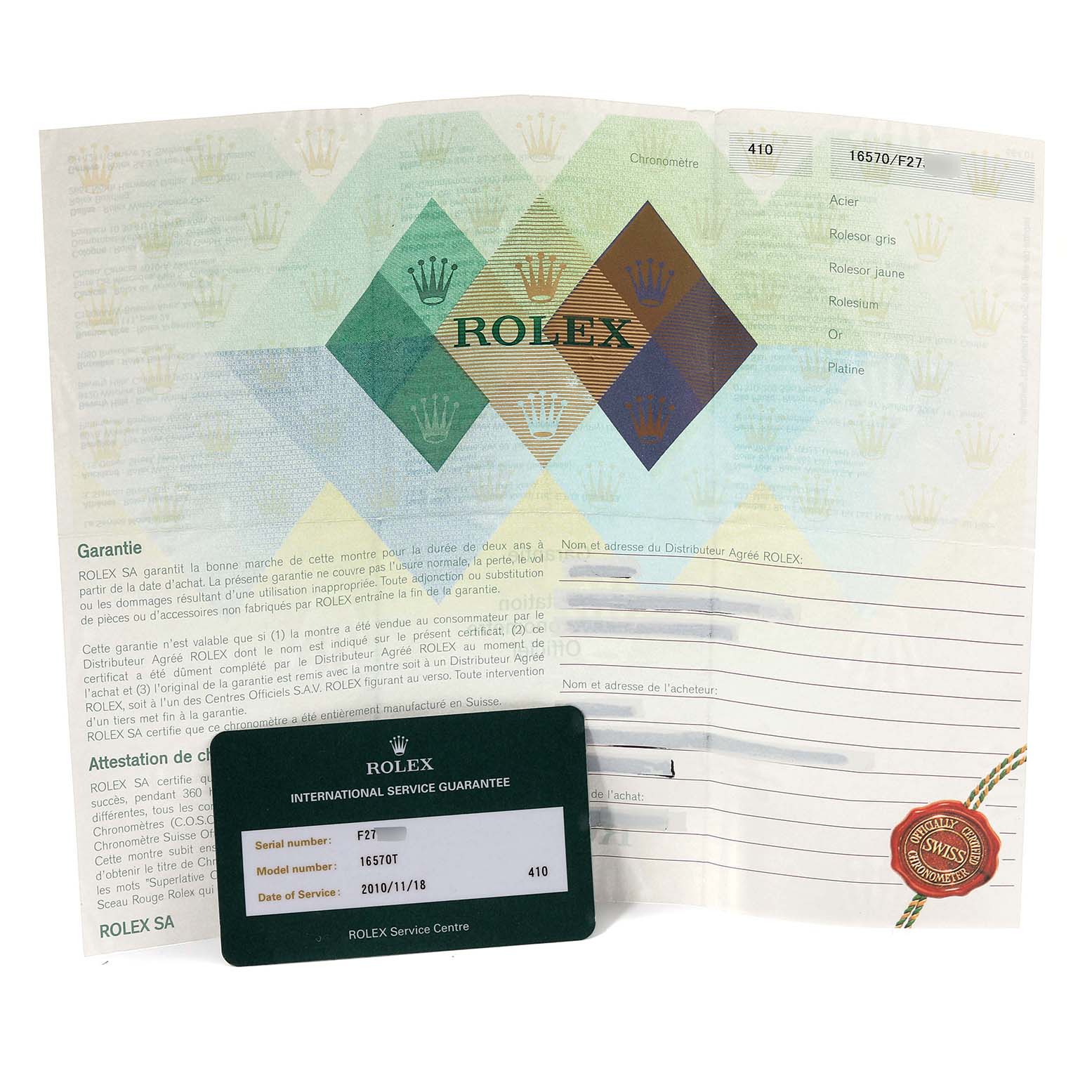 The image shows the International Service Guarantee card and warranty paperwork for the Rolex Explorer 16570T Men's Stainless Steel White Dial 16570T Men's Stainless Steel White Dial model.