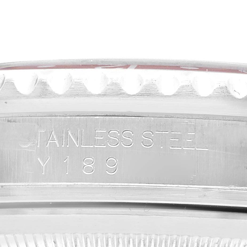 This close-up image shows the engraved case edge of the Rolex GMT-Master 16710 Men
s Stainless Steel Black Dial 16710 Men
s Stainless Steel Black Dial watch.