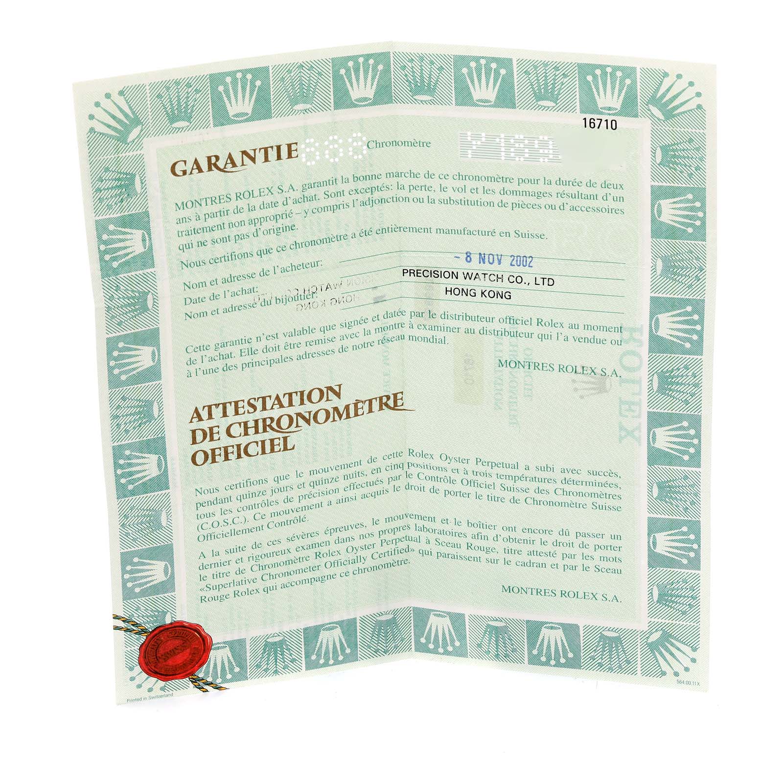 The image shows the official warranty and certification papers folded for a Rolex GMT-Master 16710 Men
s Stainless Steel Black Dial 16710 Men
s Stainless Steel Black Dial watch.