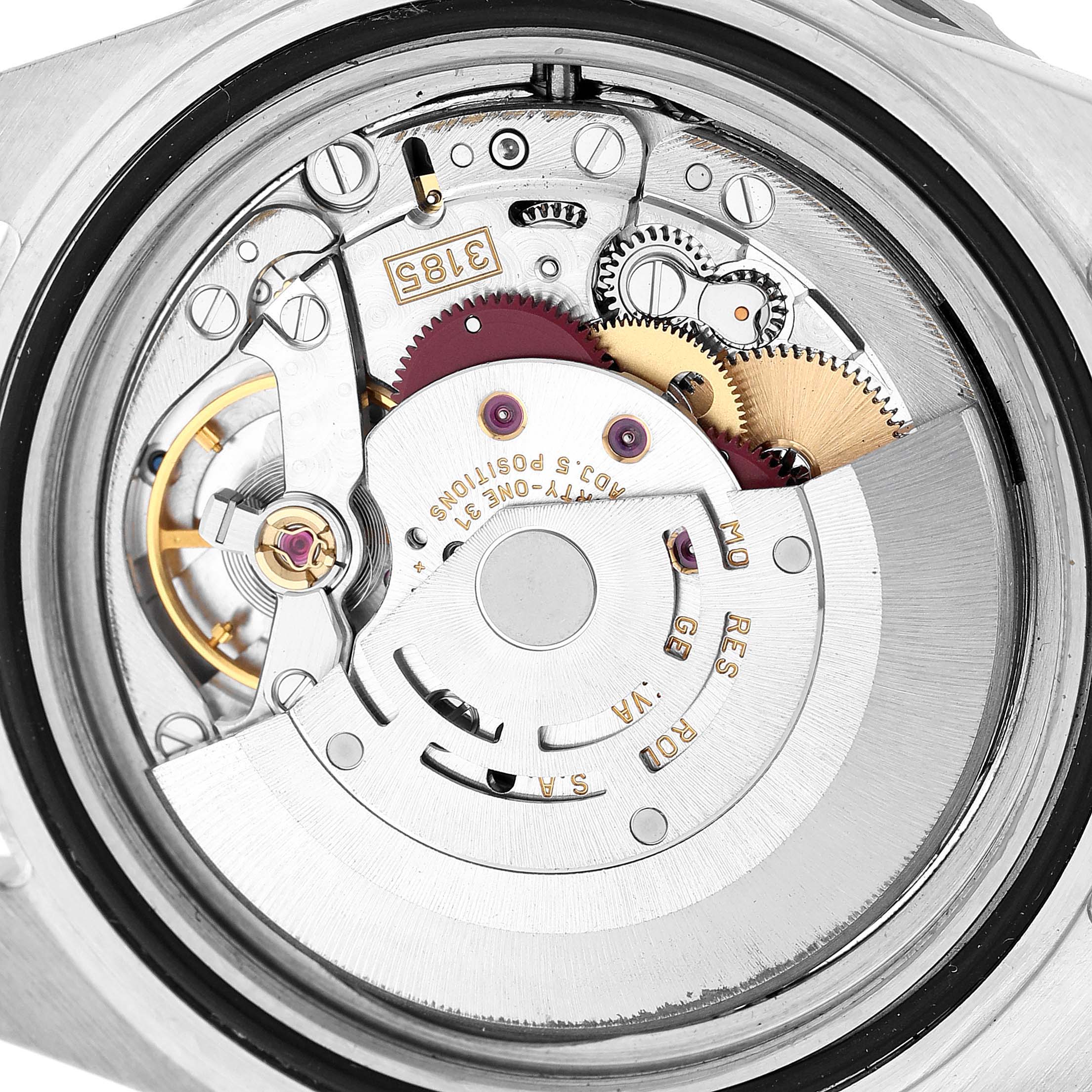 The image shows the internal movement of a Rolex GMT-Master 16710 Men's Stainless Steel Black Dial watch viewed from the back, highlighting gears and components.