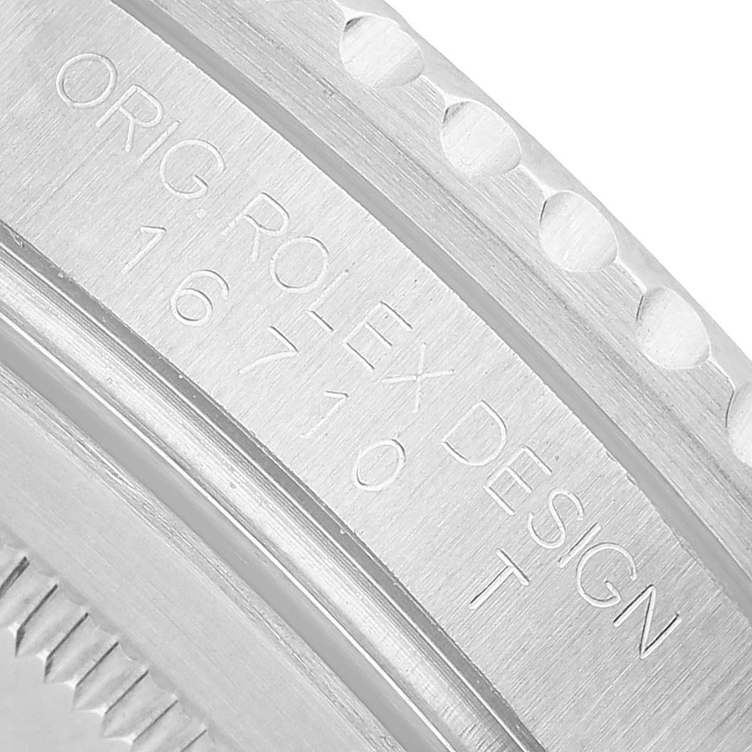 The image shows a close-up of the side case engraving on a Rolex GMT-Master 16710 Men's Stainless Steel Black Dial, highlighting "ORIG. ROLEX DESIGN 16710."