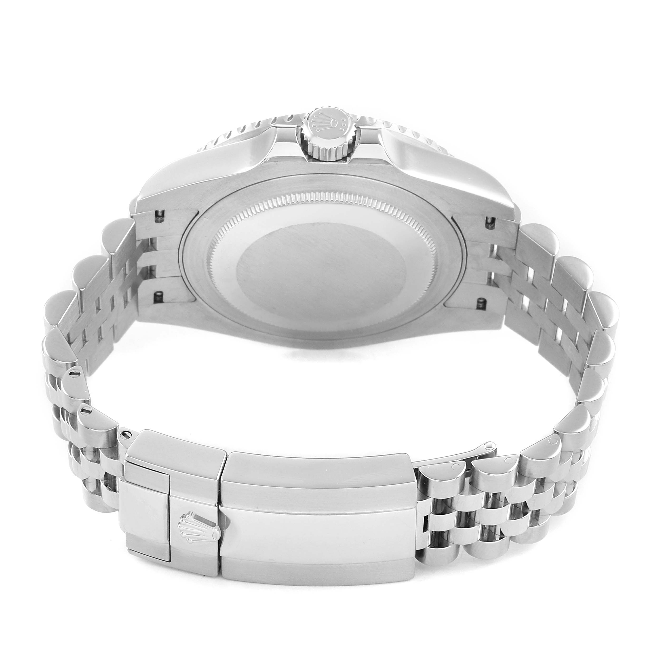 The image shows the case back, crown, and bracelet clasp of a Rolex GMT-Master 126710BLRO Men's Stainless Steel Black Dial watch from a rear angle.