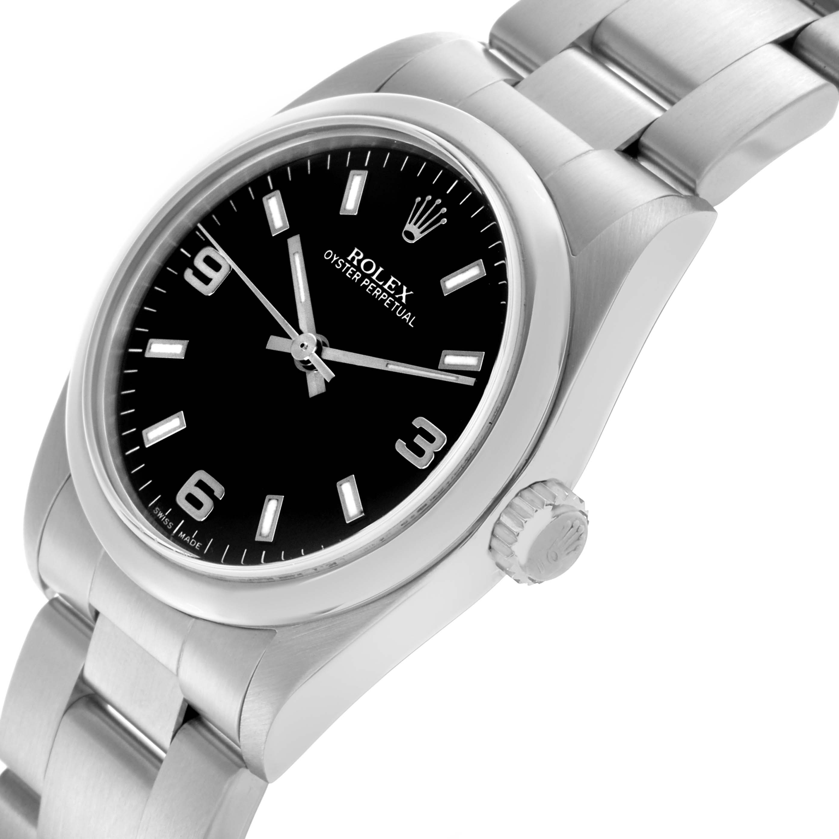 The Rolex Oyster Perpetual watch is shown from a three-quarter angle, highlighting the black dial, crown, and metal bracelet.
