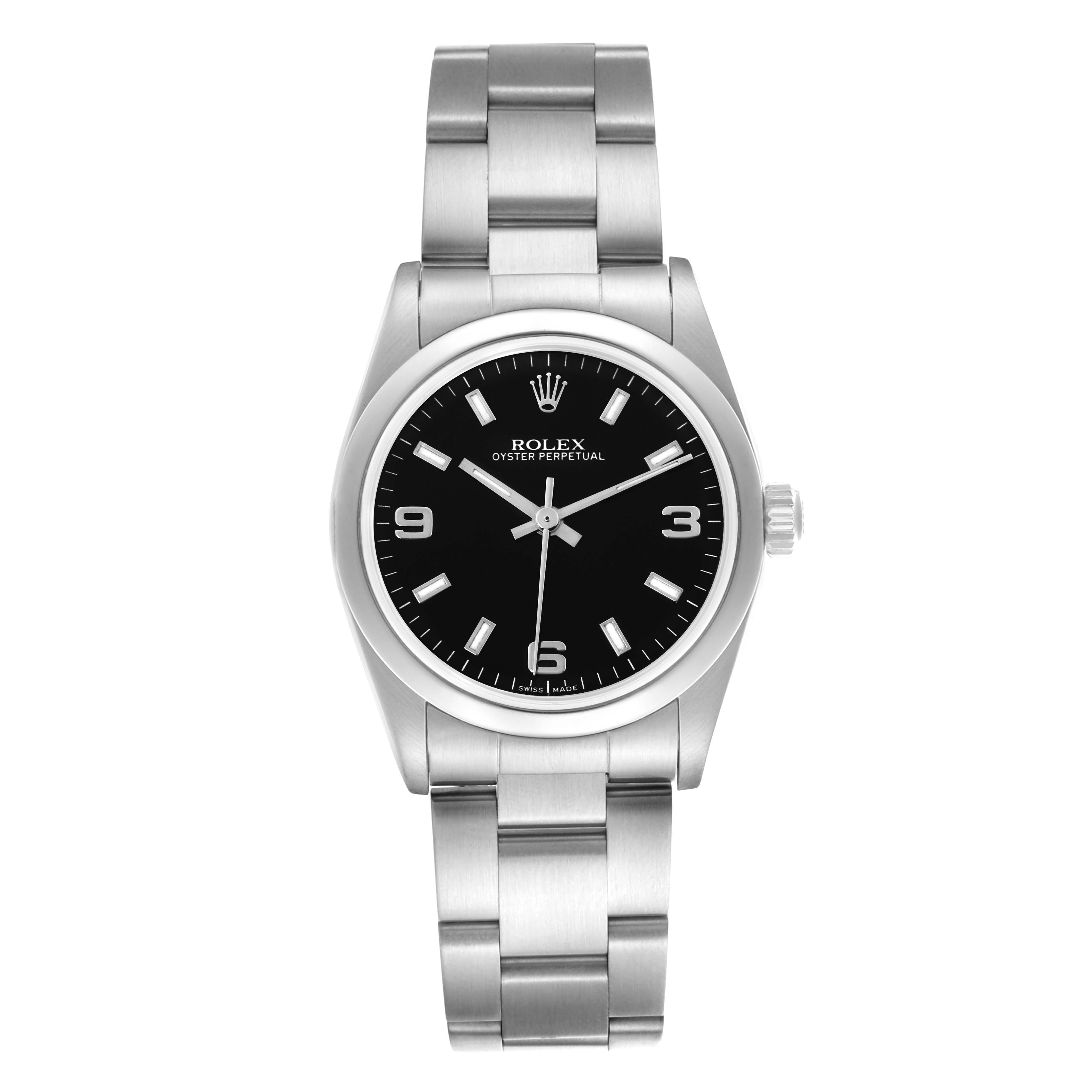 The Rolex Oyster Perpetual watch is shown from a top-down angle, displaying the dial, bracelet, and crown.