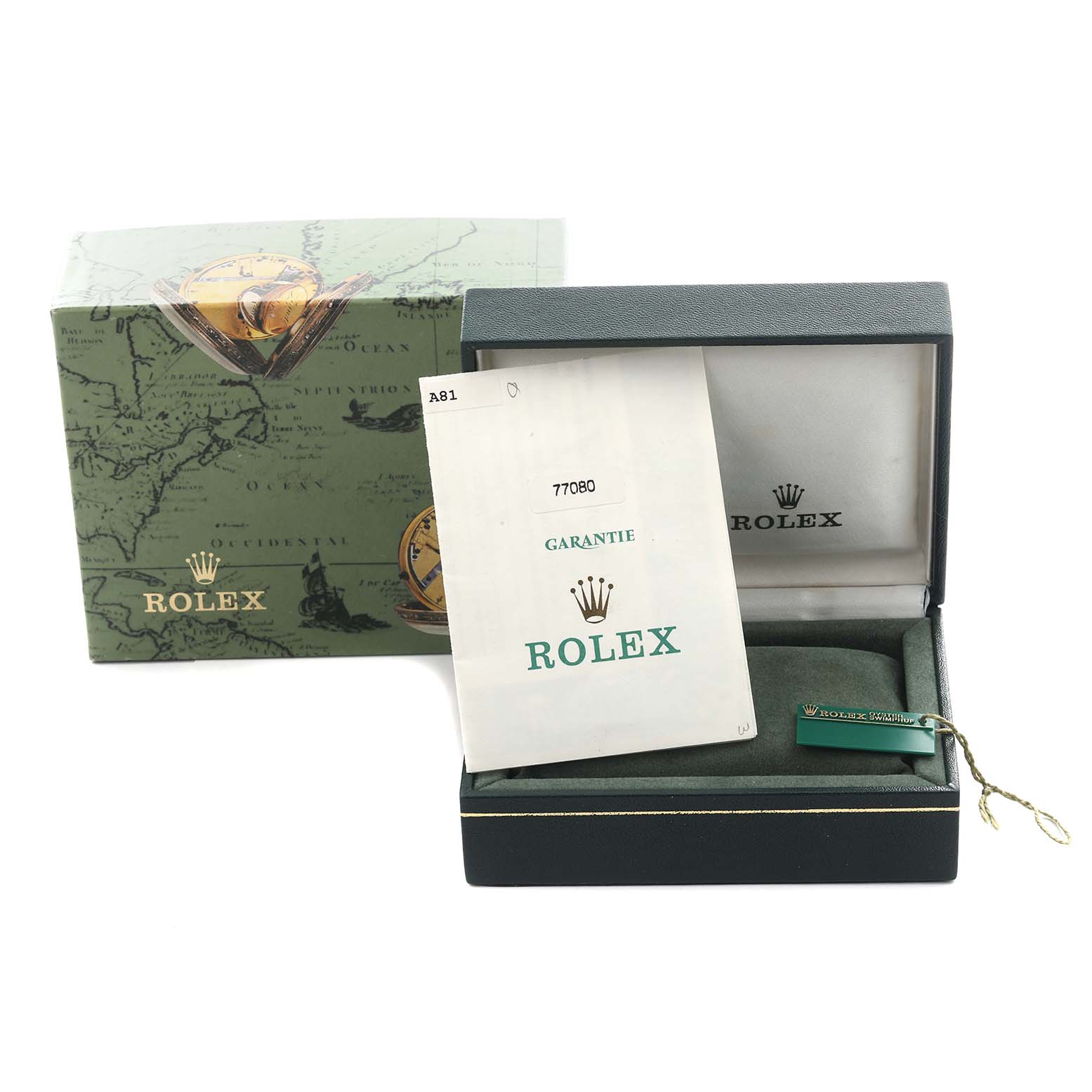 The image shows the Rolex Oyster Perpetual box, warranty papers, and a green tag, viewed from the front.