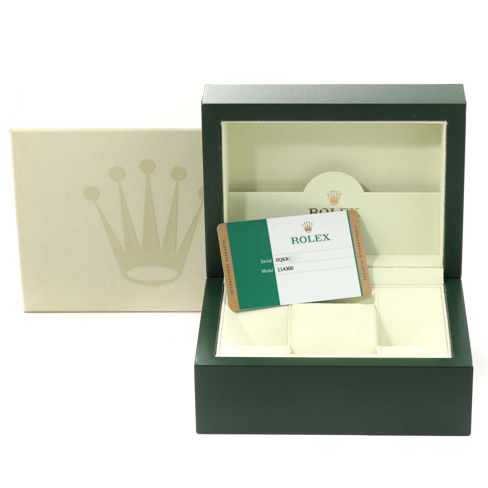 The image shows an open box and Best Quality
ity card for a Rolex Oyster Perpetual 114300 Men
s Stainless Steel Black Dial 114300 Men
s Stainless Steel Black Dial model.