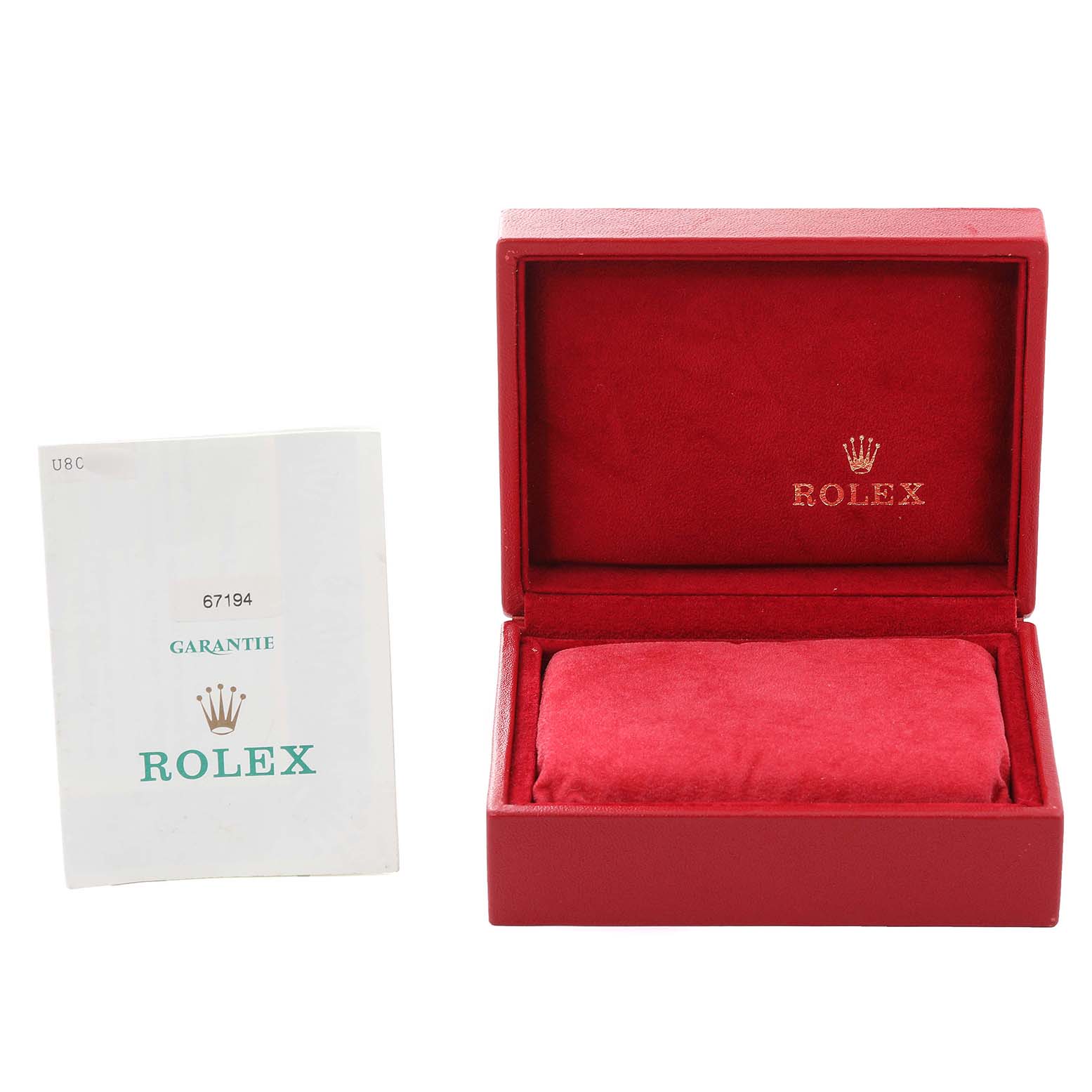 The image shows a red Rolex watch box and a warranty card for the Oyster Perpetual model, both viewed from the top.