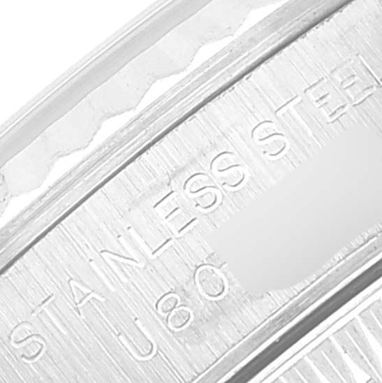 The image shows a close-up of the engraved text on the stainless steel case back of a Rolex Oyster Perpetual 67194 Women's Stainless Steel Blue Dial 67194 Women's Stainless Steel Blue Dial watch.