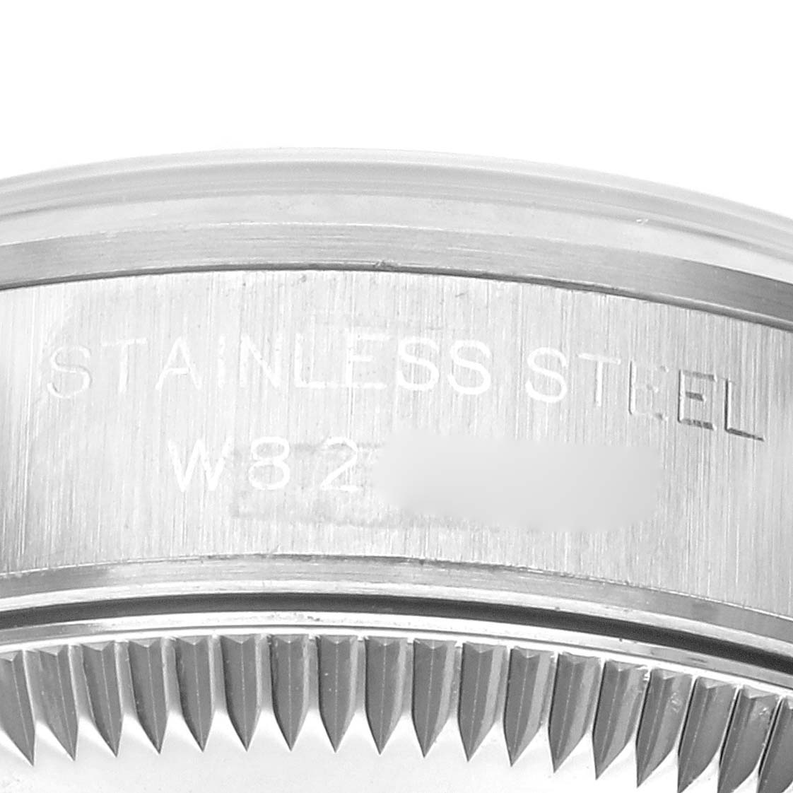 This image shows a close-up of the case side and bezel details of a Rolex Oyster Perpetual 67180 Women's Stainless Steel Pink Dial 67180 Women's Stainless Steel Pink Dial watch.