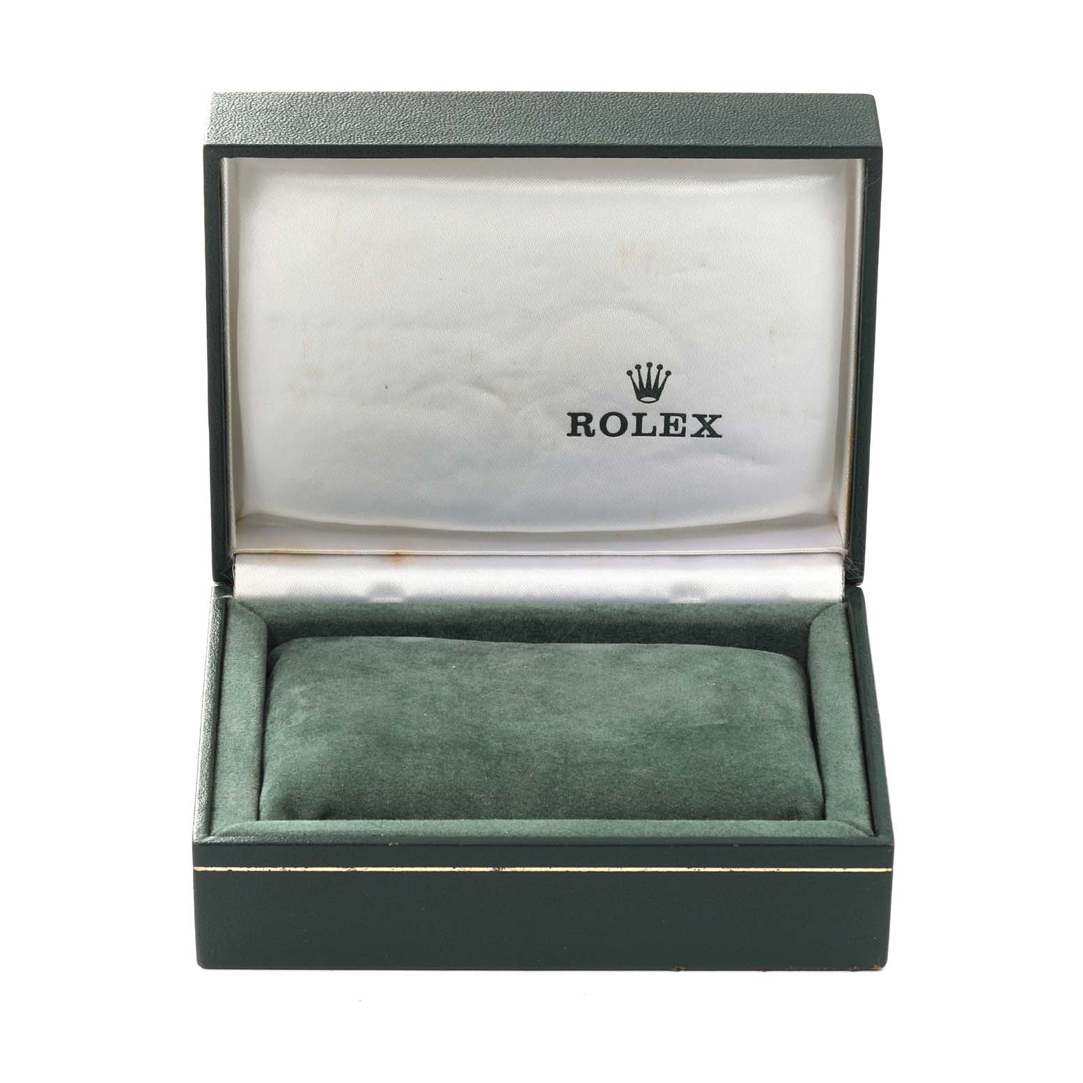 The image shows an open green Rolex watch box for the Oyster Perpetual model, showcasing the interior cushion.