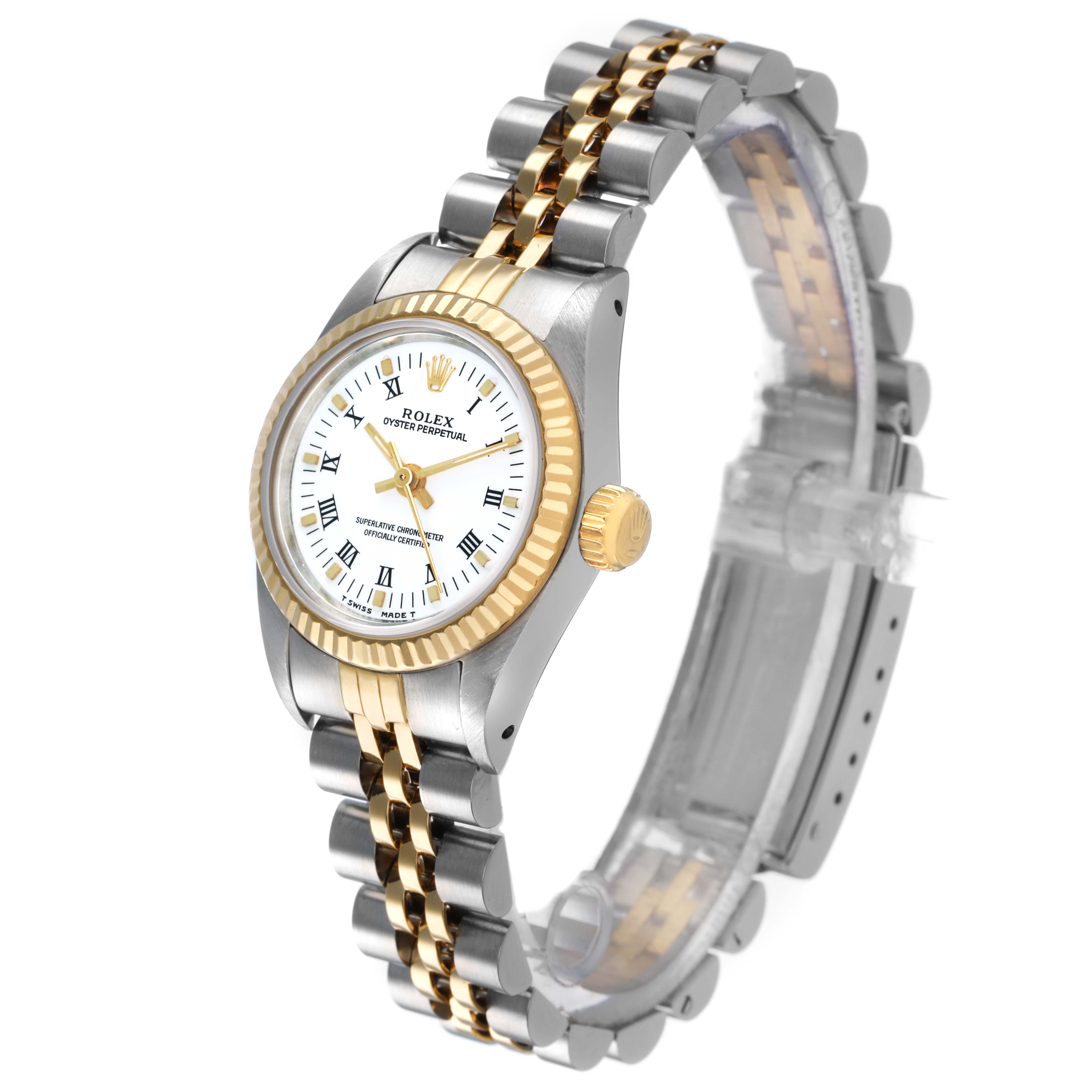 The Rolex Oyster Perpetual 67193 Women's Stainless Steel White Dial watch is shown at an angle highlighting the face, bezel, crown, and two-tone bracelet.