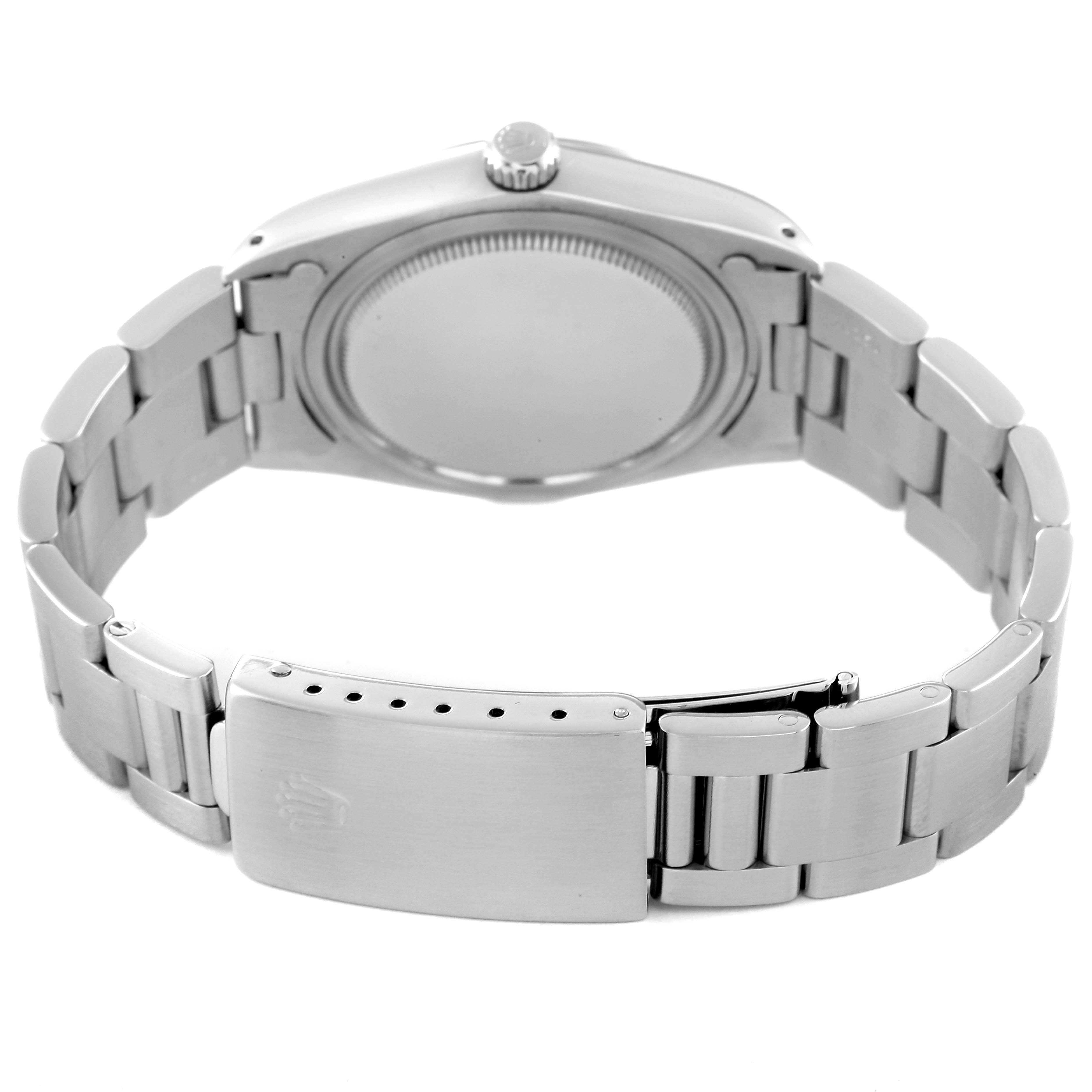 The image shows the back view of a Rolex Vintage Collection 6694 Men
s Stainless Steel Silver Dial 6694 Men
s Stainless Steel Silver Dial model watch, highlighting the clasp and bracelet.