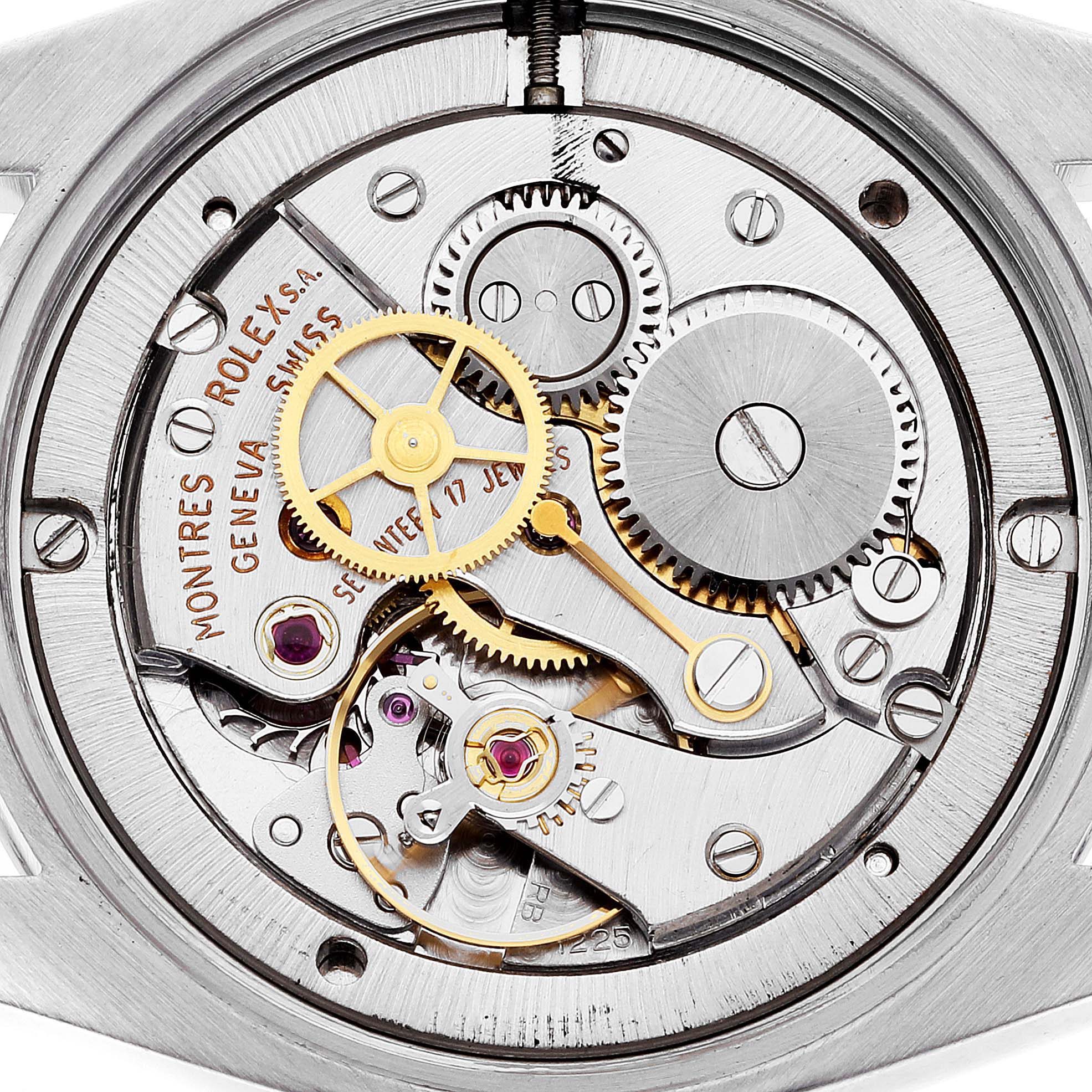 This image shows the intricate inner mechanism of a Vintage Collection model by Rolex at a close-up angle.