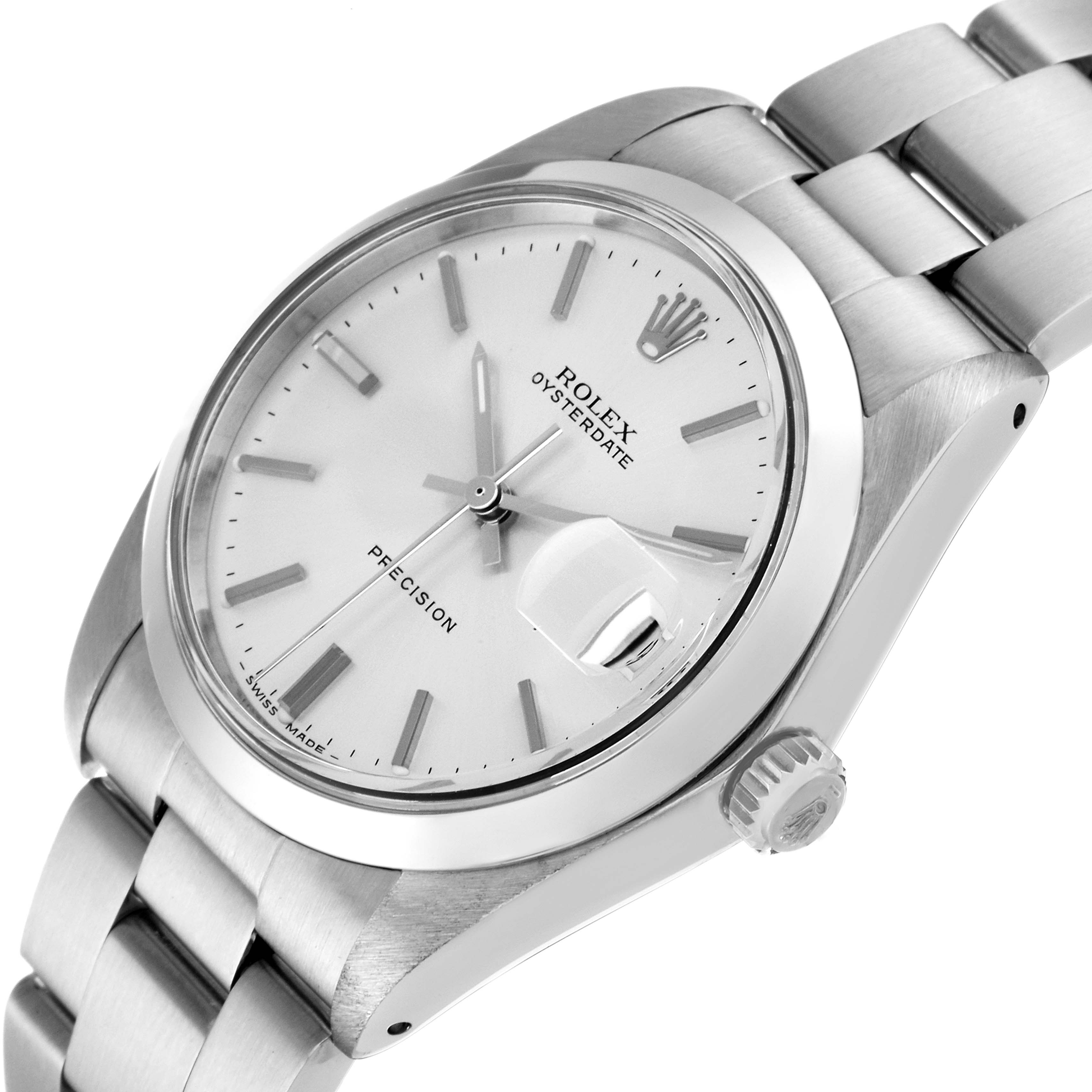 The image displays a Rolex Vintage Collection 6694 Men
s Stainless Steel Silver Dial 6694 Men
s Stainless Steel Silver Dial Oysterdate Precision watch from a slightly tilted angle, showing the face, case, crown, and metal bracelet.