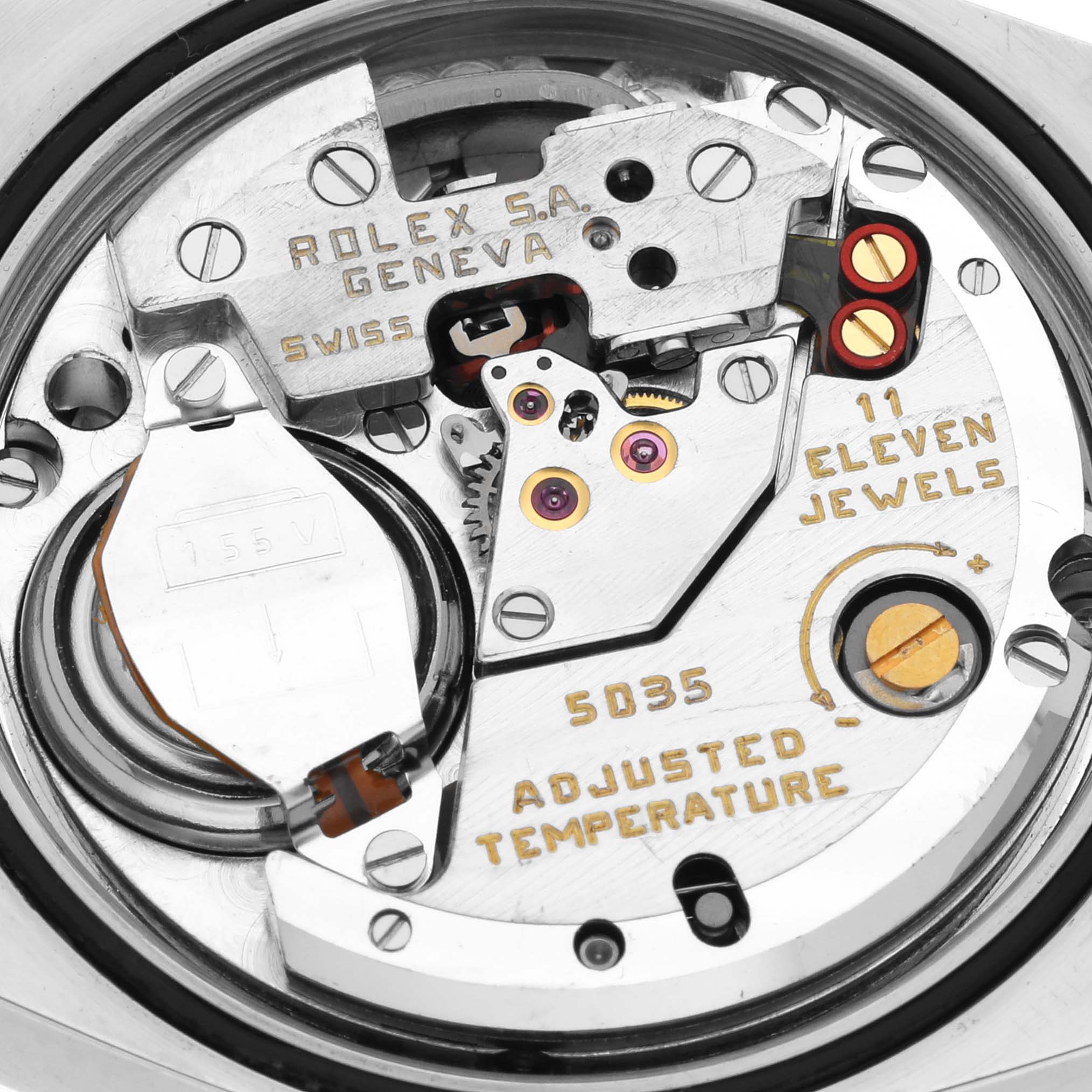 The image shows the inner movement of the Rolex Oysterquartz 17013 Men's Steel and Gold (two tone) Champagne Dial 17013 Men's Steel and Gold (two tone) Champagne Dial watch, highlighting jewels and battery from the top angle.