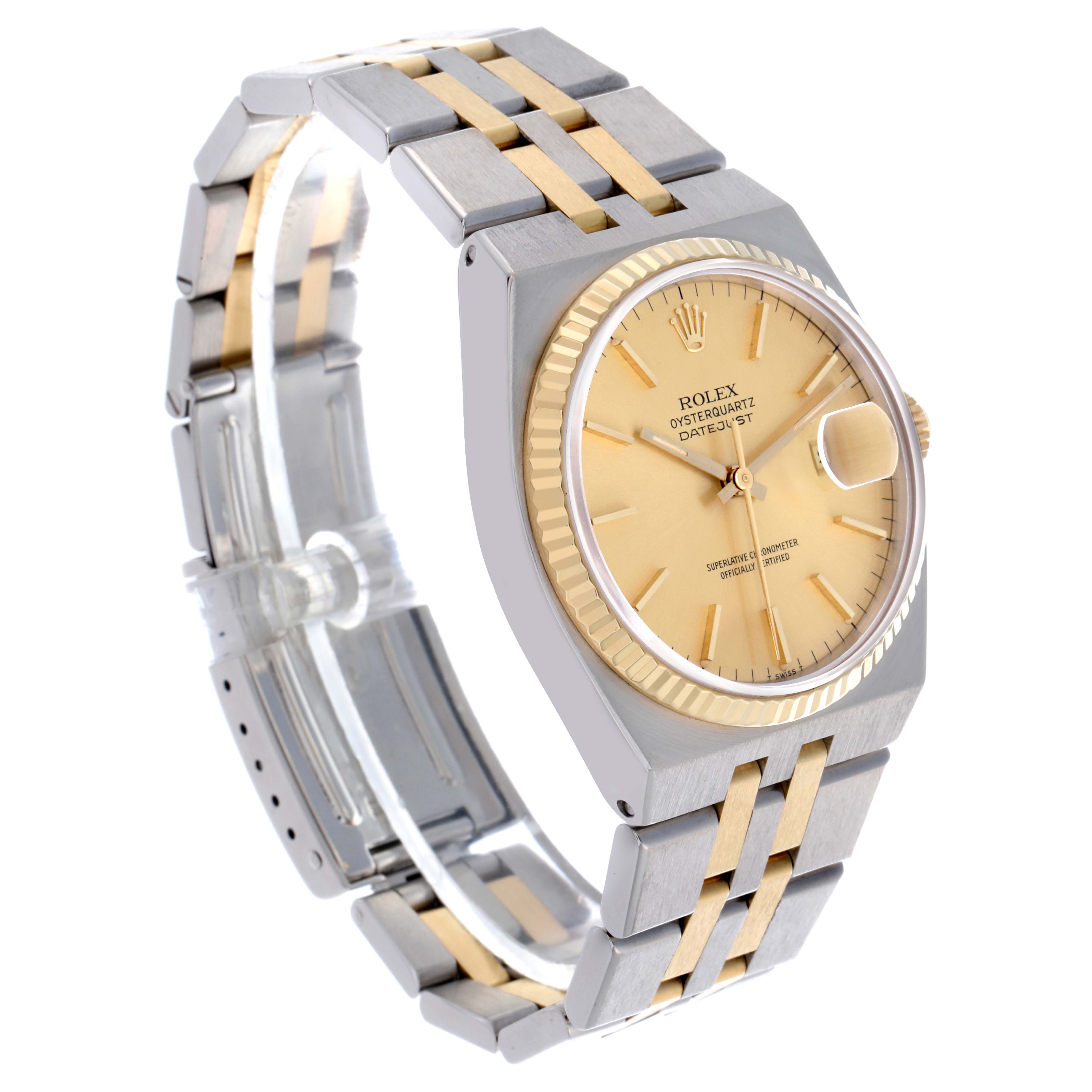 The Rolex Oysterquartz 17013 Men's Steel and Gold (two tone) Champagne Dial 17013 Men's Steel and Gold (two tone) Champagne Dial watch is shown from a front angle, displaying its face, bezel, and partially integrated bracelet.
